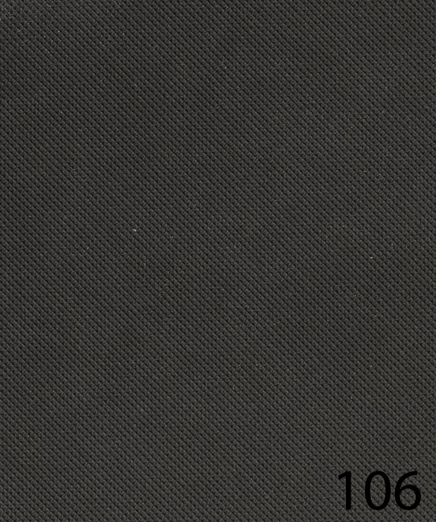 Close-up of a black textured fabric with a small white number '106' in the bottom right corner.