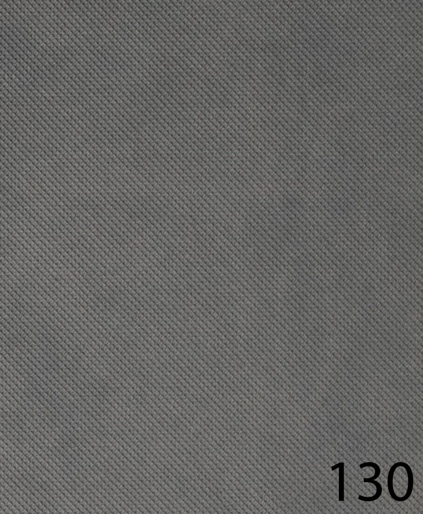 Close-up of gray textured fabric with black number 130 in the bottom right corner.