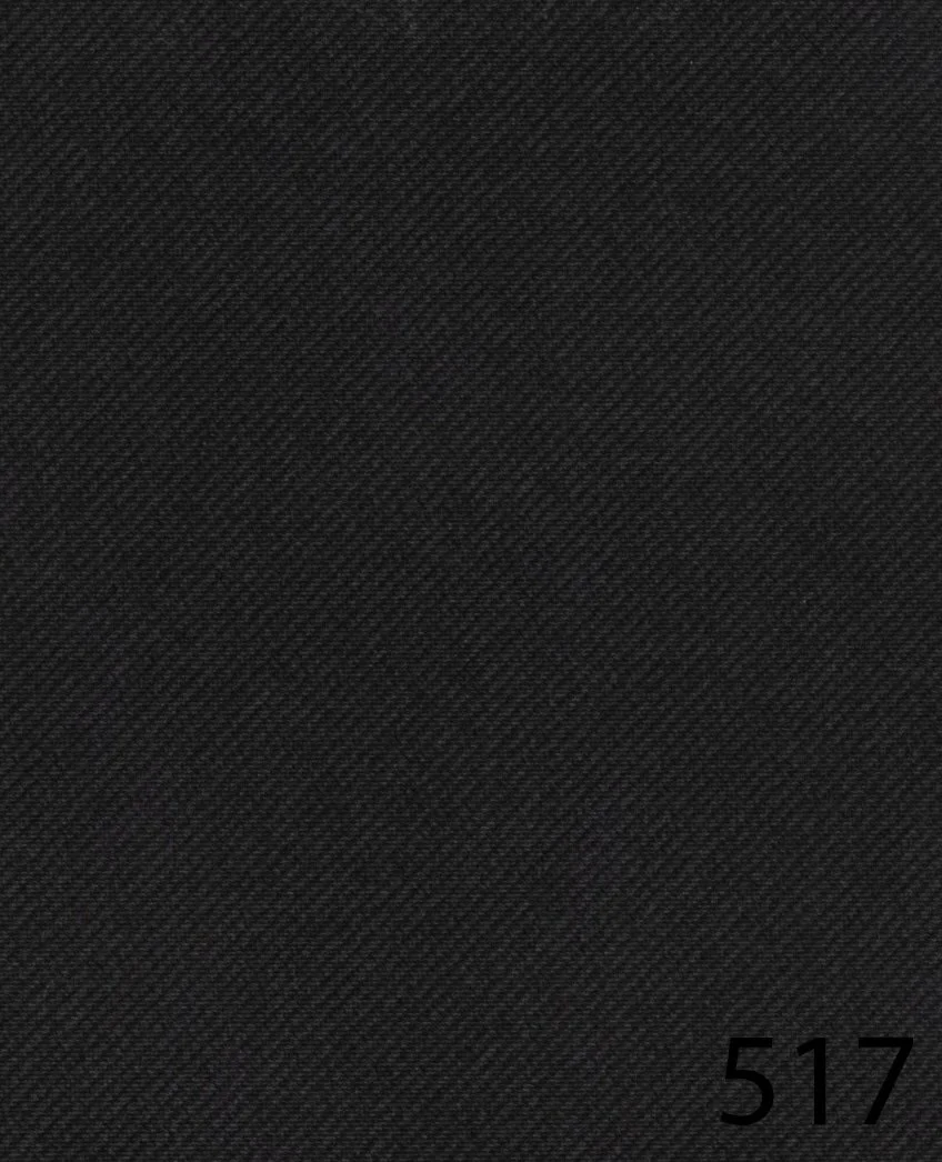 Close-up of black fabric with a small white number '517' in the bottom right corner.