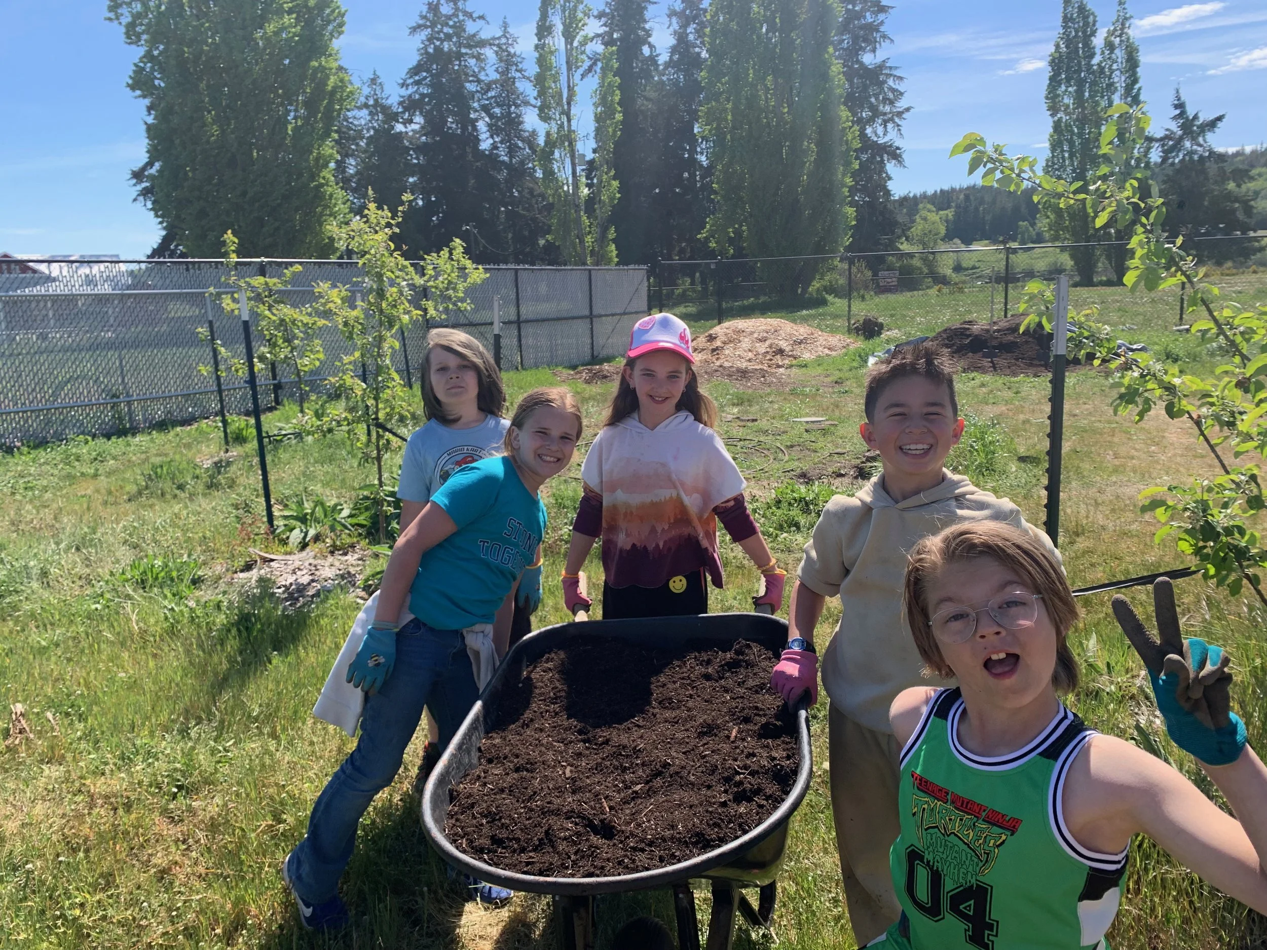 kids with compost fun.jpeg