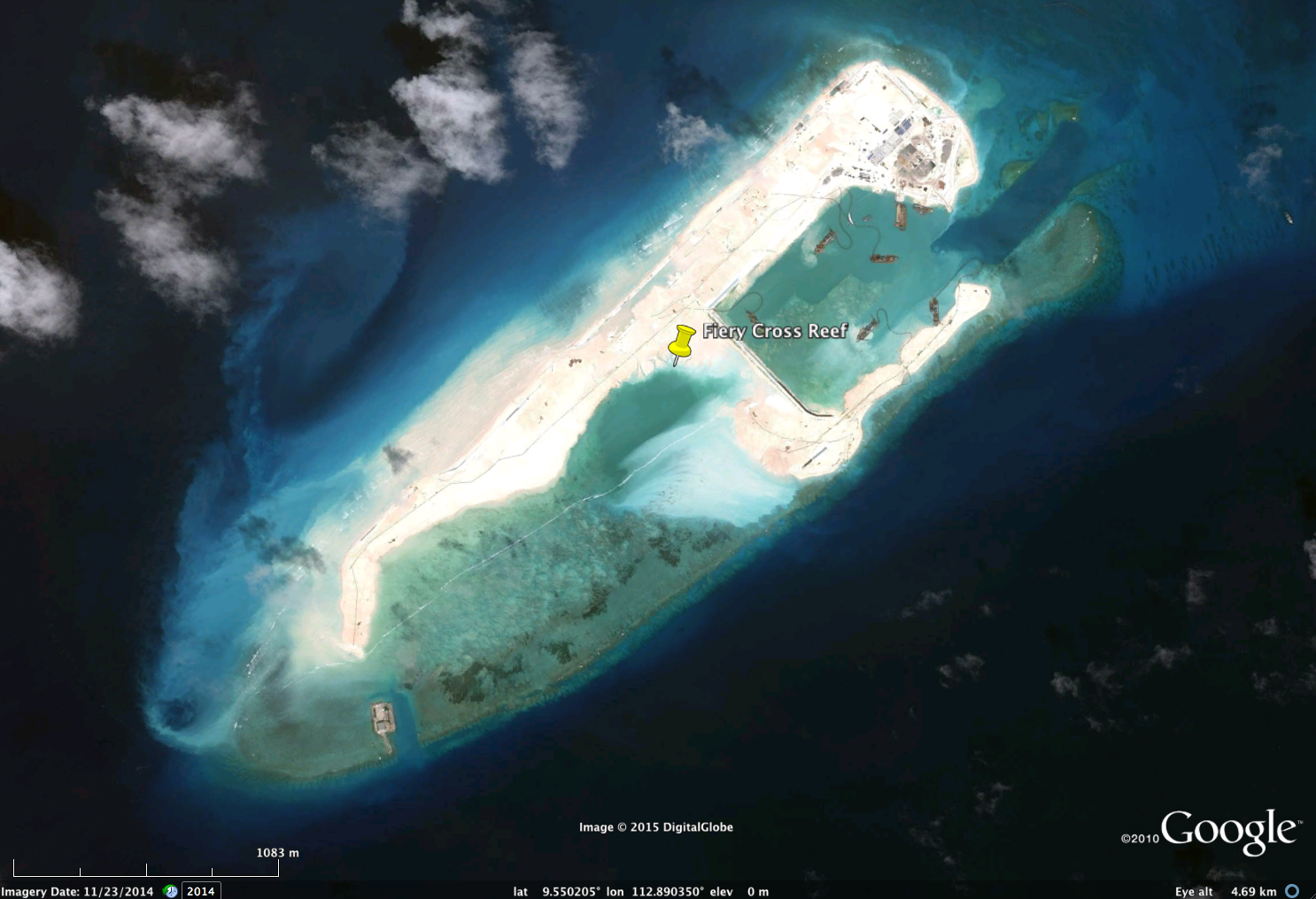  FieryCrossReef, Nov.&nbsp;23, 2014. Bright white and light brown areas are ‘reclaimed’ land, i.e., where sediments have been&nbsp;dredged from adjacent seafloor areas and pumped on top of live coral reefs (which die&nbsp;once smothered). Note presen