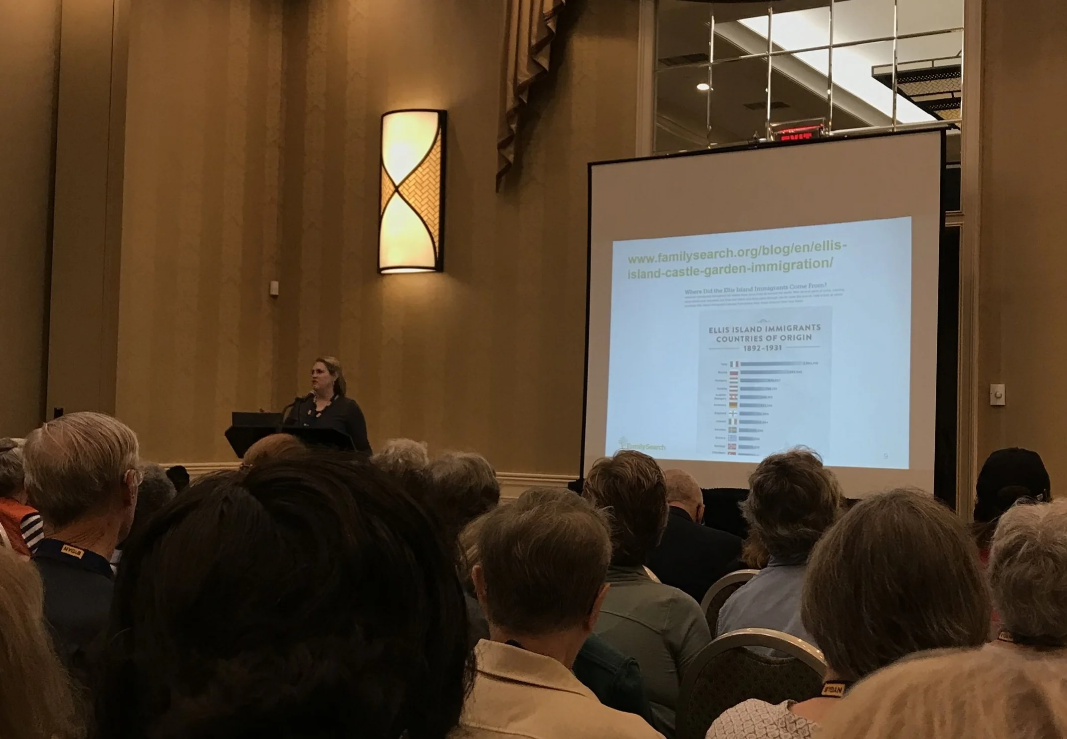 Cherie Bush giving a presentation at the NYG&B Conference about FamilySearch and the “Do You Know..” study.