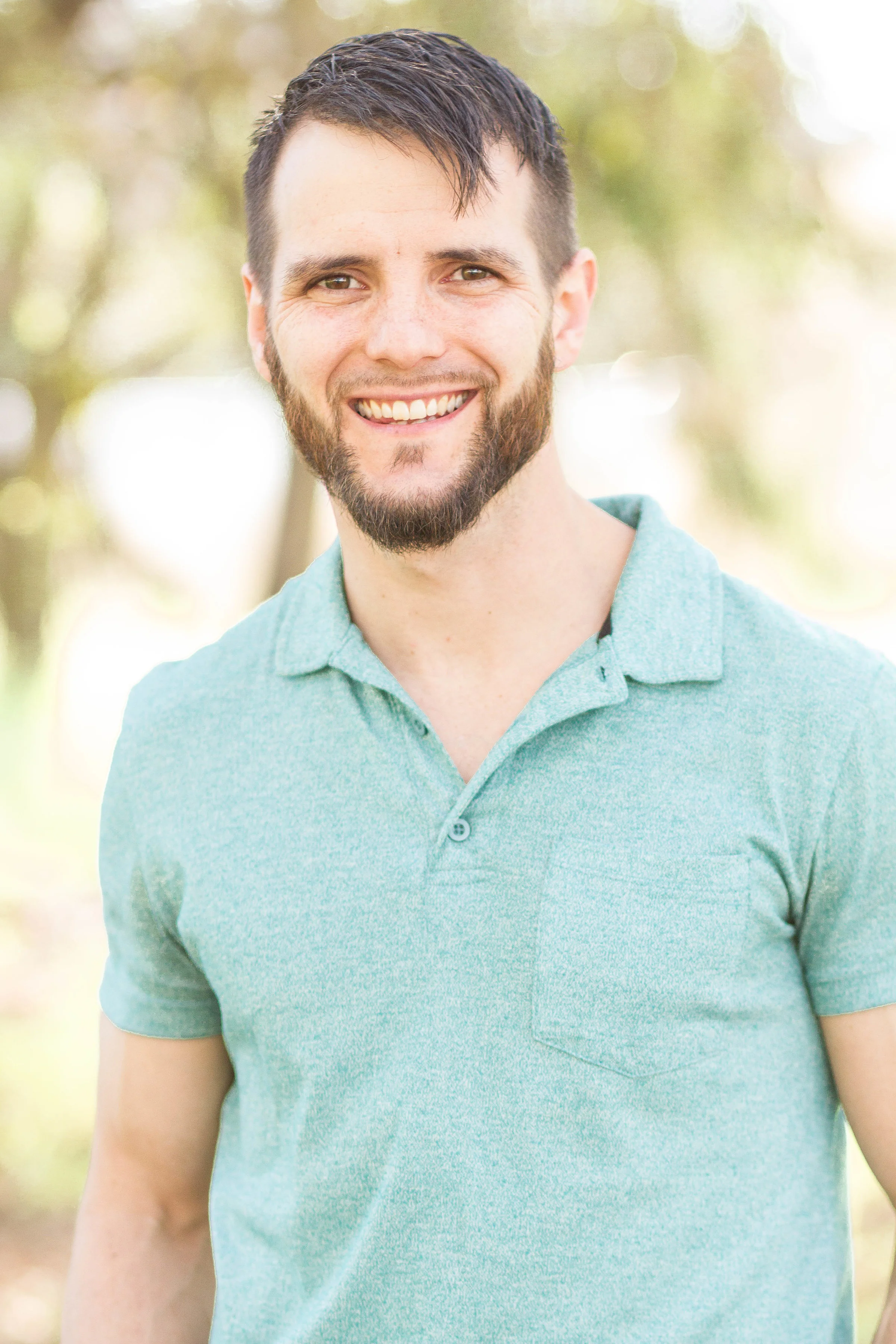 josiah head shot - green shirt.jpg
