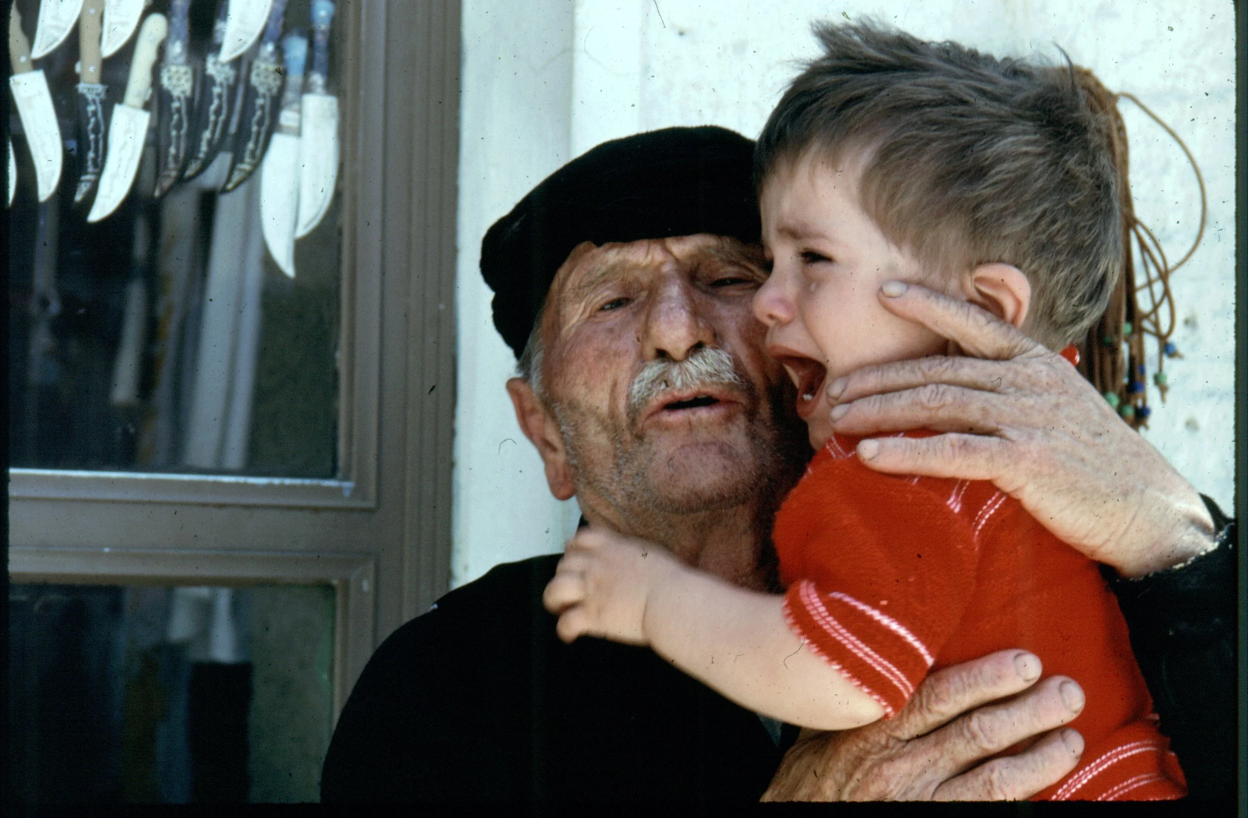 GR Working Grandfather babysitter in Crete.jpg
