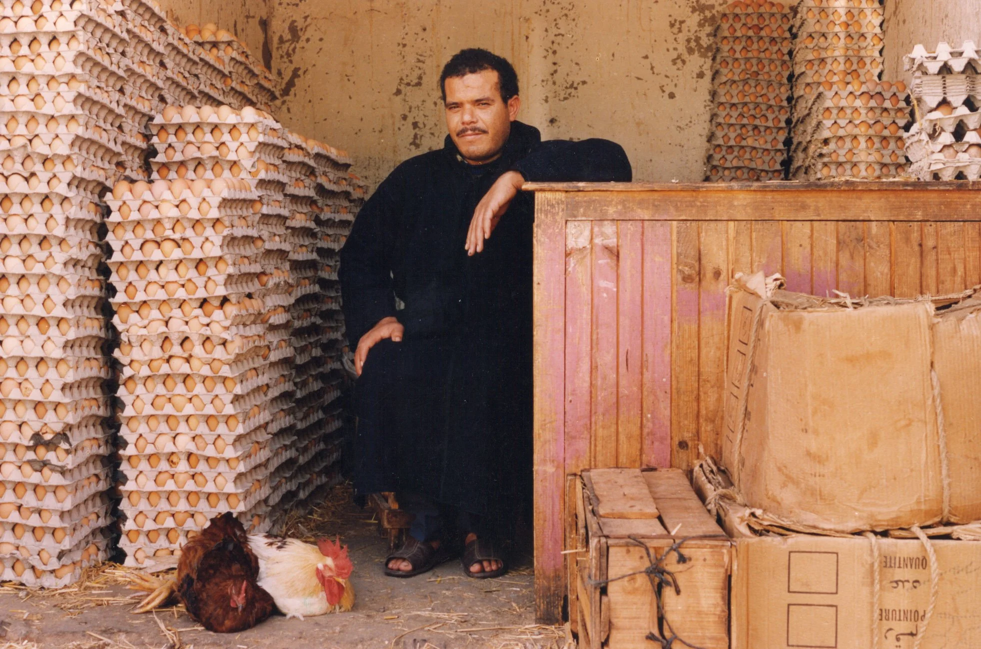 MOR Working Man selling eggs in Marrakesh Souk.jpg