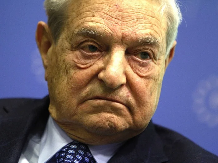 G. Soros.