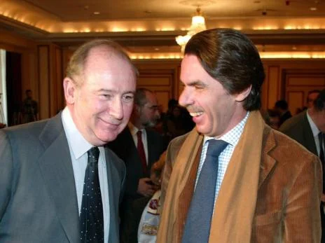 Rato y Aznar.