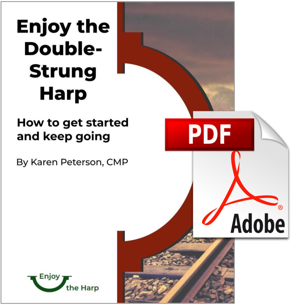Cover of Enjoy the Double-Strung Harp instruction book with an Adobe PDF label. Cover image has a red harp icon and a photograph of train tracks.
