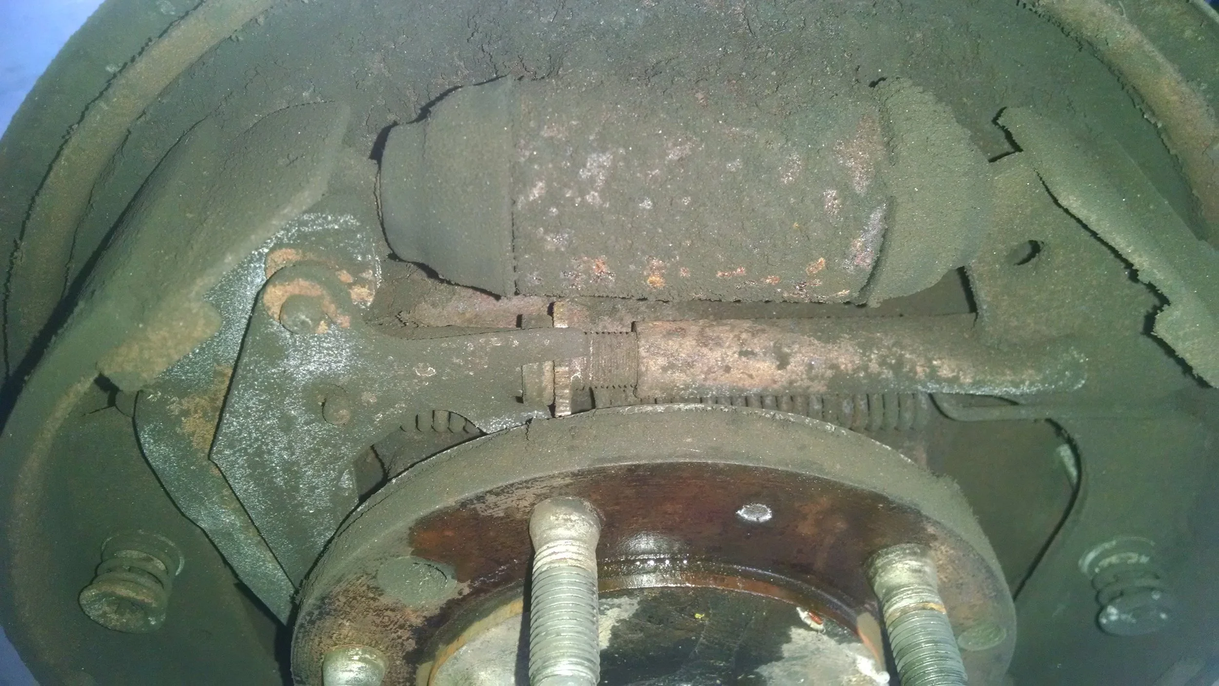 Although this one is on the dry side, many are also leaking at the wheel cylinder.