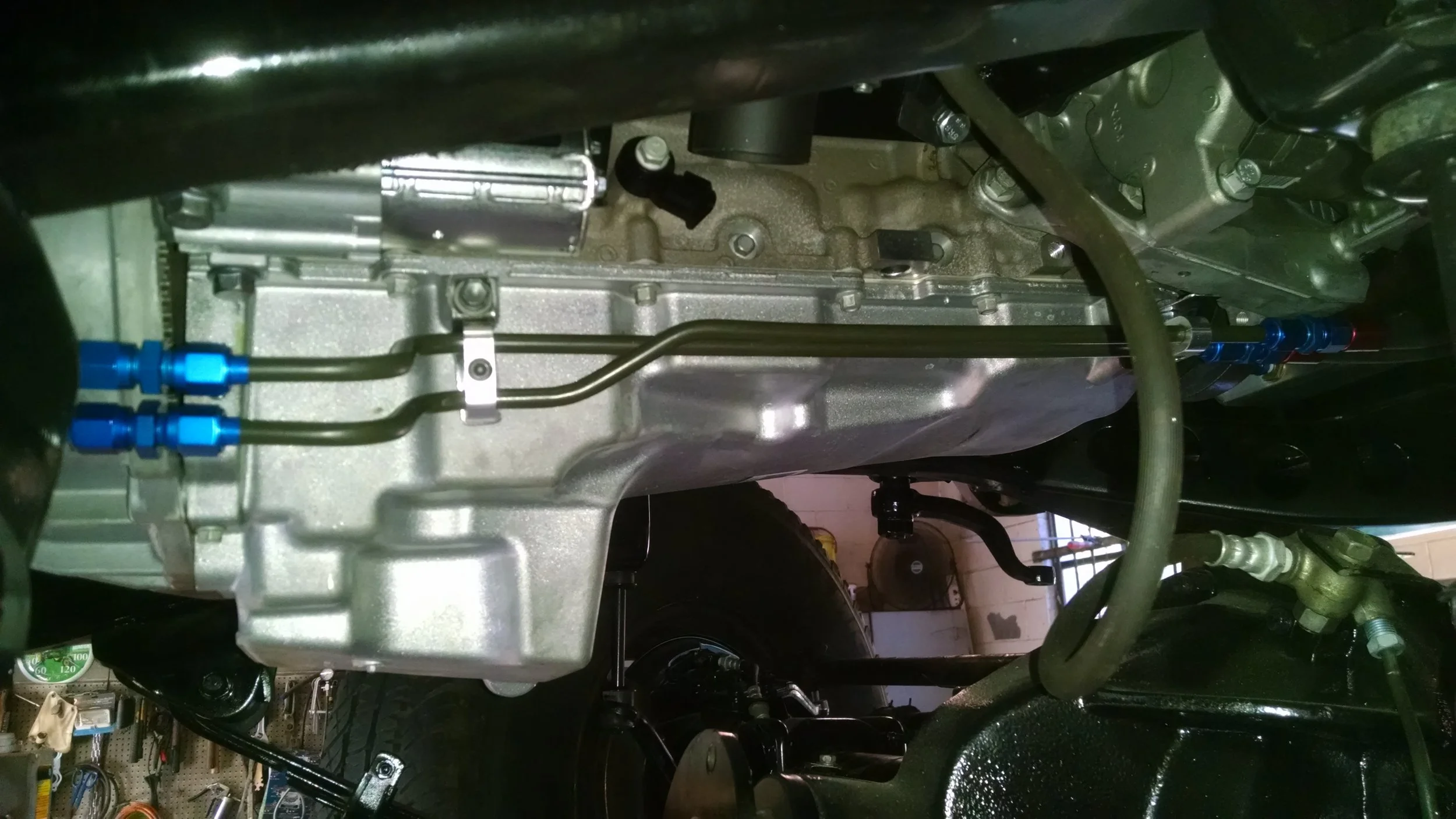 All fluid lines use AN fittings for ease of service. Fittings shown allow removal of motor or trans without long trans cooler lines to contend with.