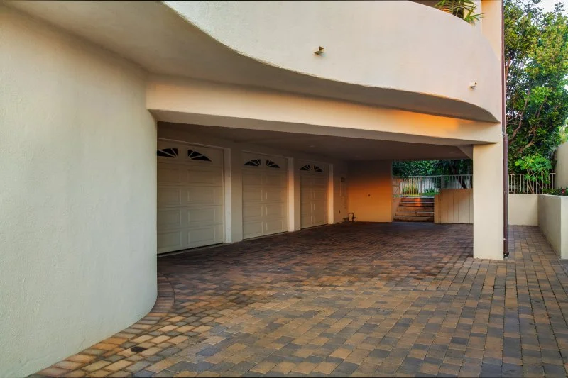 Hidden three-car garage