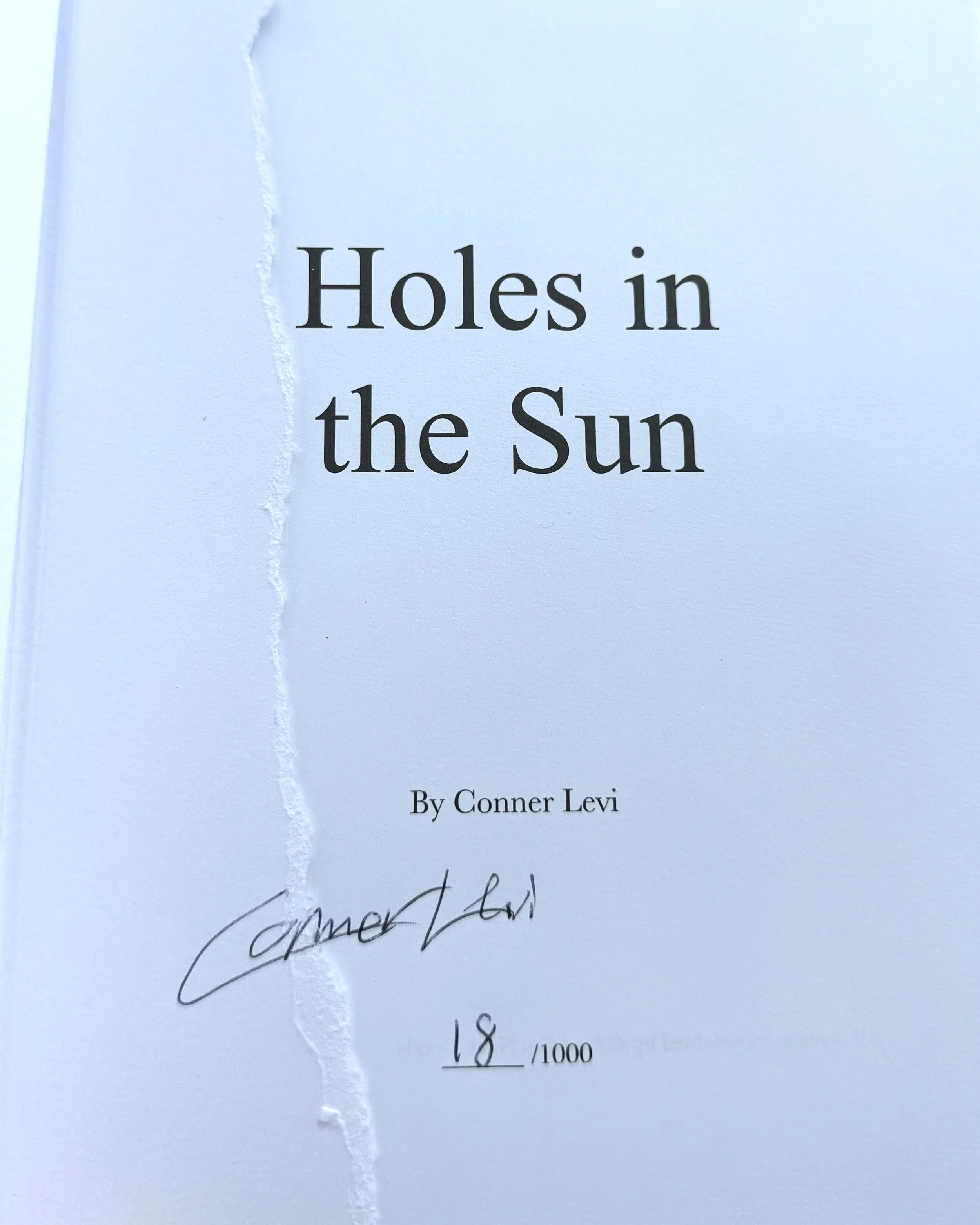 Holes_in_the_sun_Conner_Levi_Poetry_page1.jpg