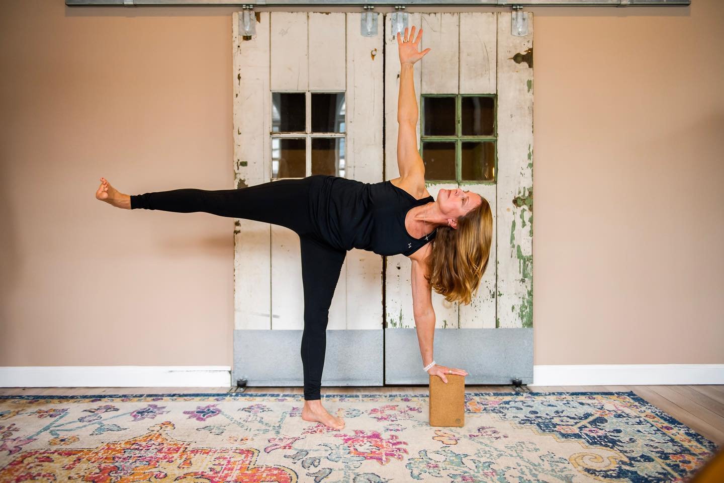 Half moon
Ardha Chandrasana (are-dah chan-DRAHS-anna)

&bull; Start in Utthita Trikonasana (Extended Triangle) with your left foot forward.
&bull; Bring your right hand to your hip and turn your head to look at the floor.
&bull; Bend your front leg a