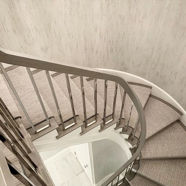 Contemporary custom staircase Mirror stainless spindles by Empire Metal. Manhattan duplex