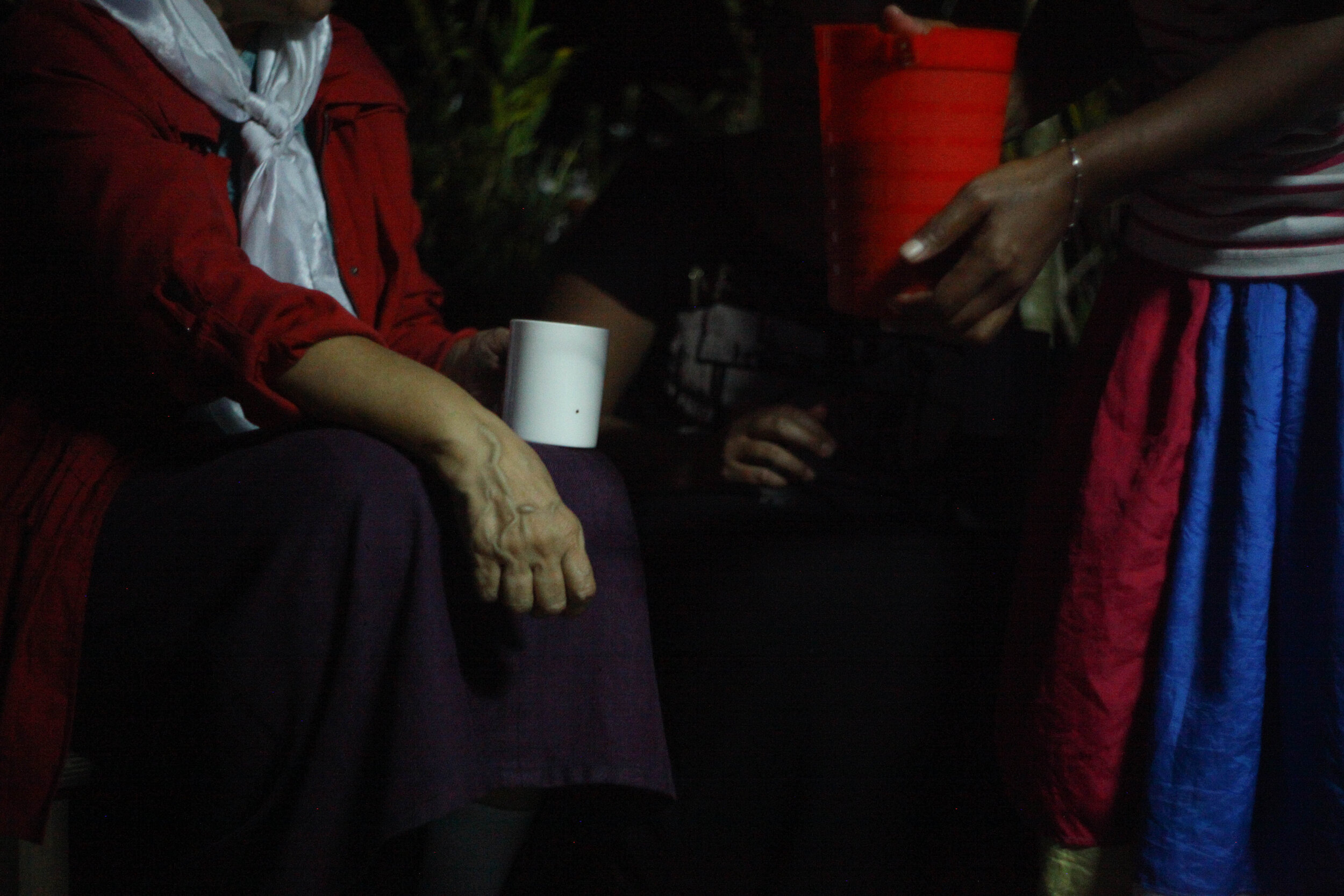 Luisa pours tea after Mass 