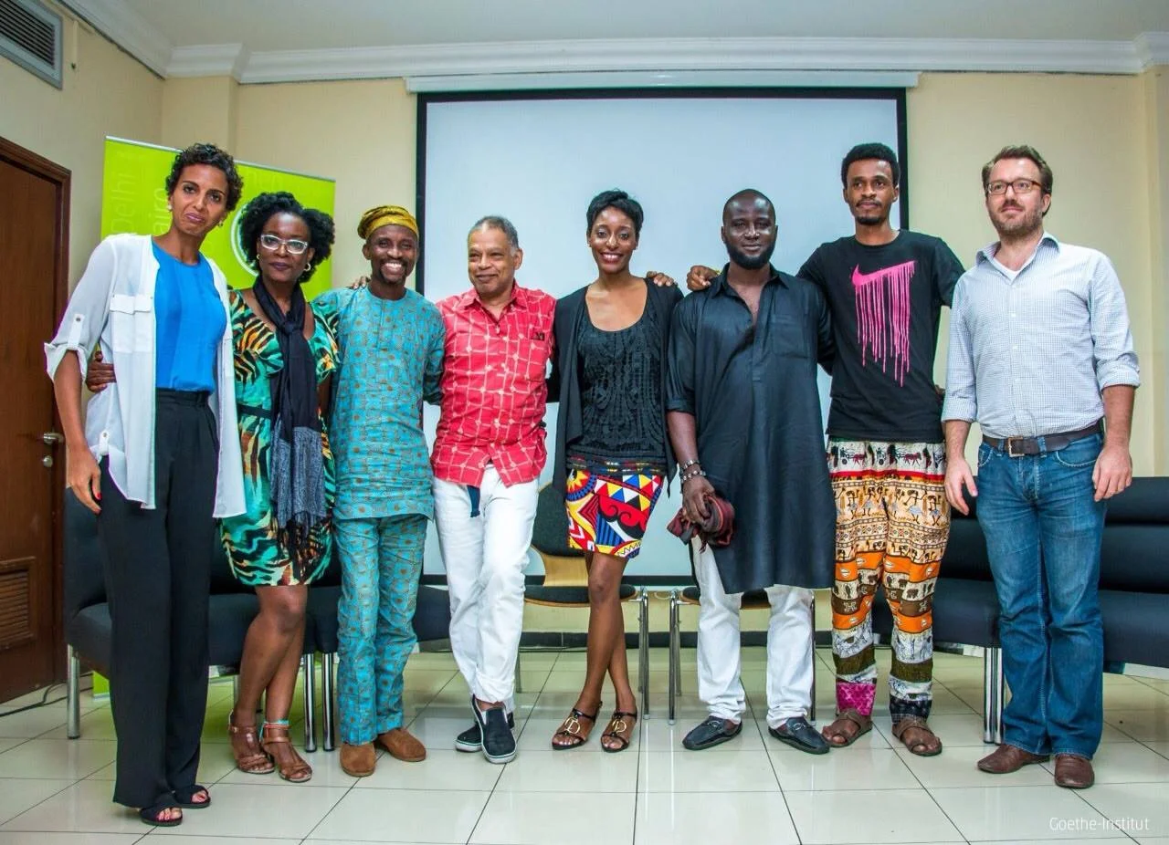 In spring 2015 Ishmael Houston-Jones took part in a Pecha Kucha in Lagos, Nigeria sponsored by the Goethe Institute. Artists from left, Yetunde Babaeko, Peju Alatise, Jelili Atiku, IH-J, Zemaye Okediji, Pwavido Mathias, Folakunle Oshun and Marc-André Schmachtel, (Goethe Institute). Photo courtesy of Goethe Institute, Lagos