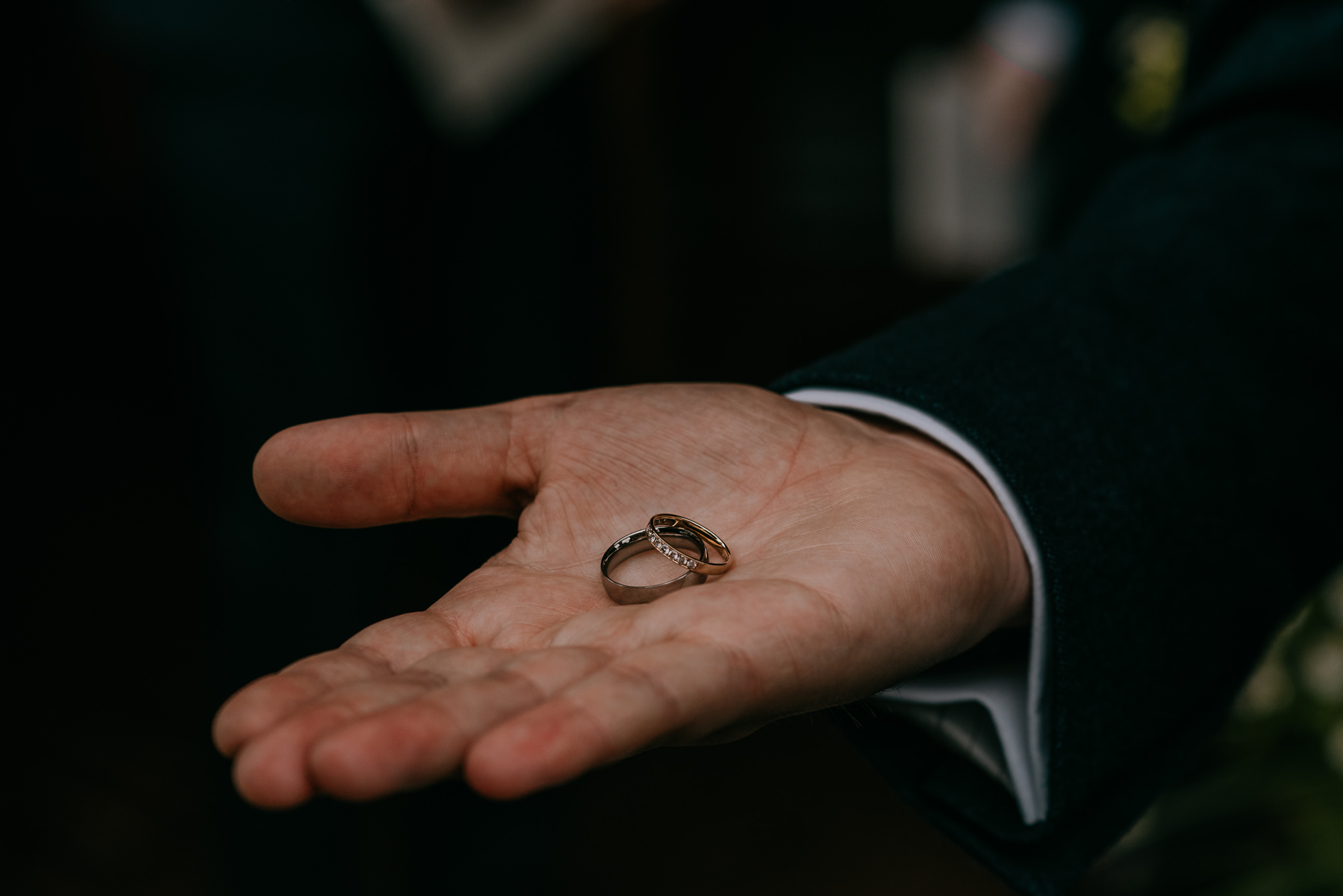  groom holding wedding rings in palm Northern Ireland Wedding Photographers 