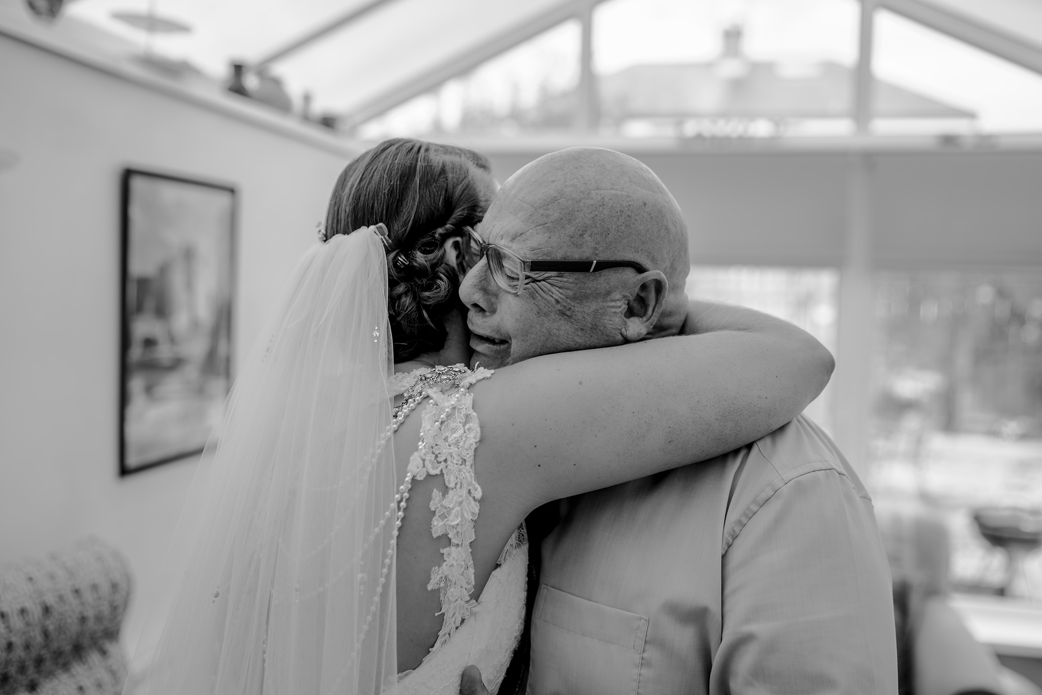 Father of bride hugs first look emotional