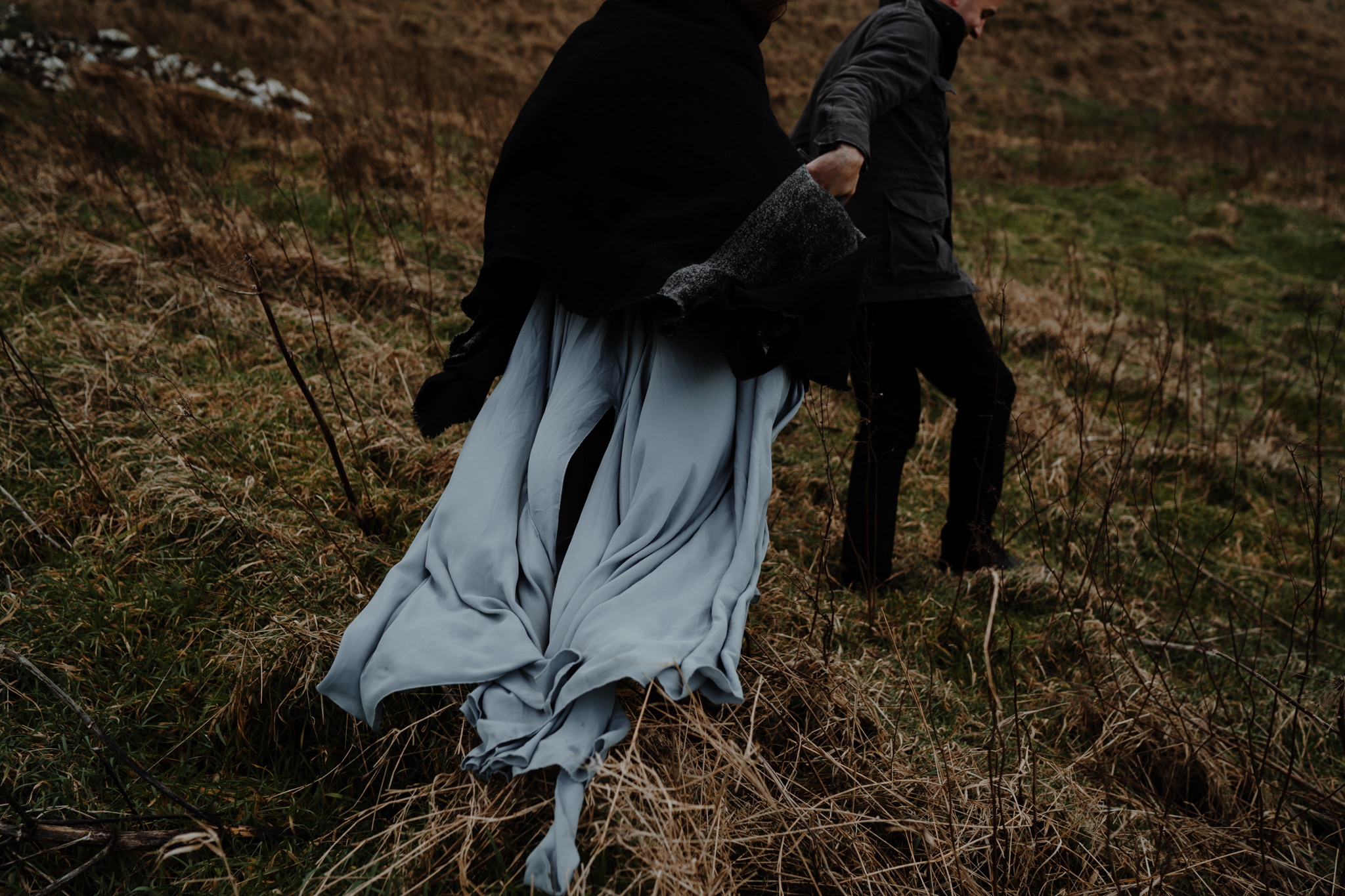 wanderlust rustic elopement northern ireland wind swept dress kinbane castle