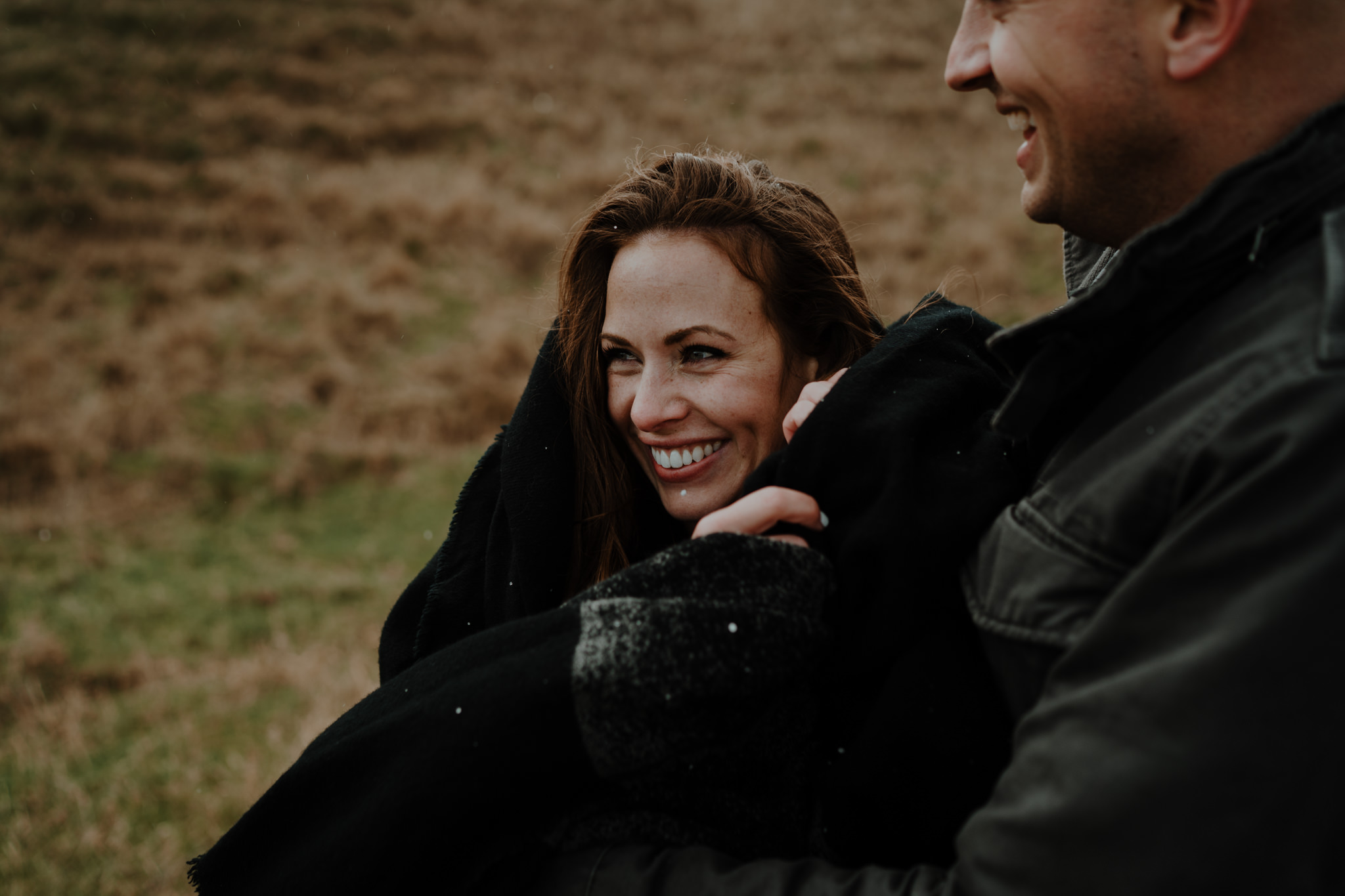 american couple visit ireland kinbane castle laughing