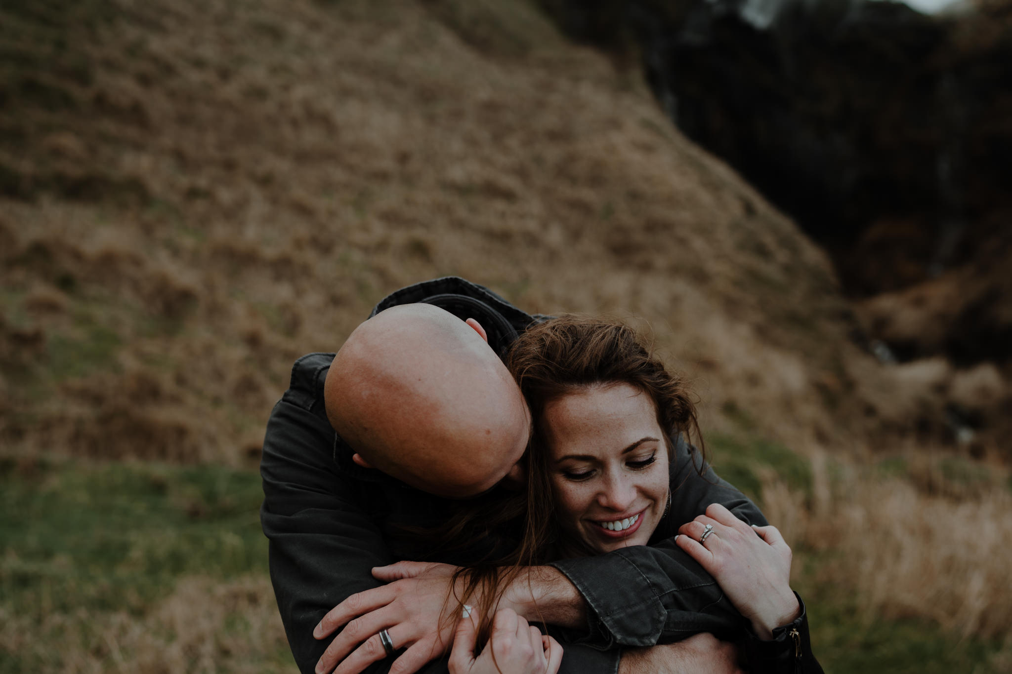 adventure travel kinbane castle couple hugging