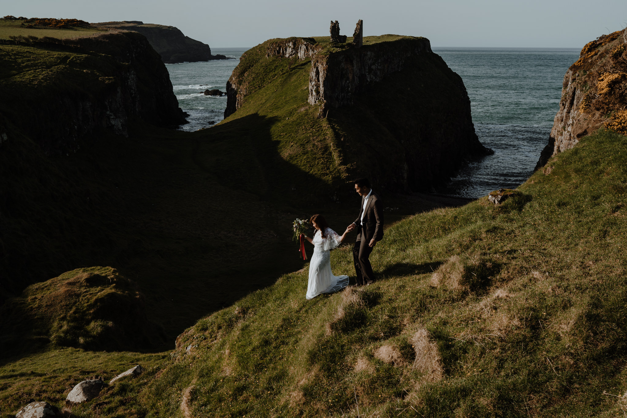 Asian couple destination Ireland Dunseverick castle pre wedding engagement photography