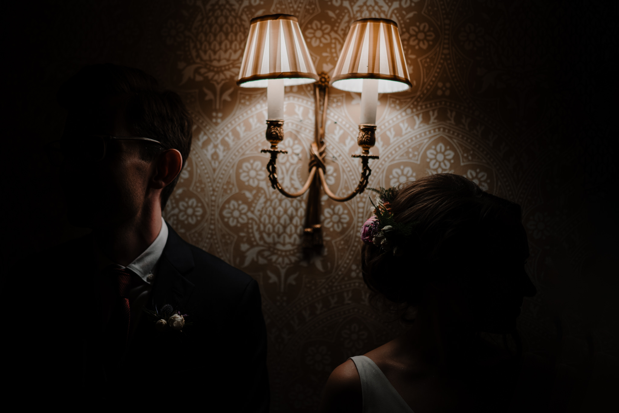 Intimate Wes Anderson style wedding crom castle bride groom lamplight
