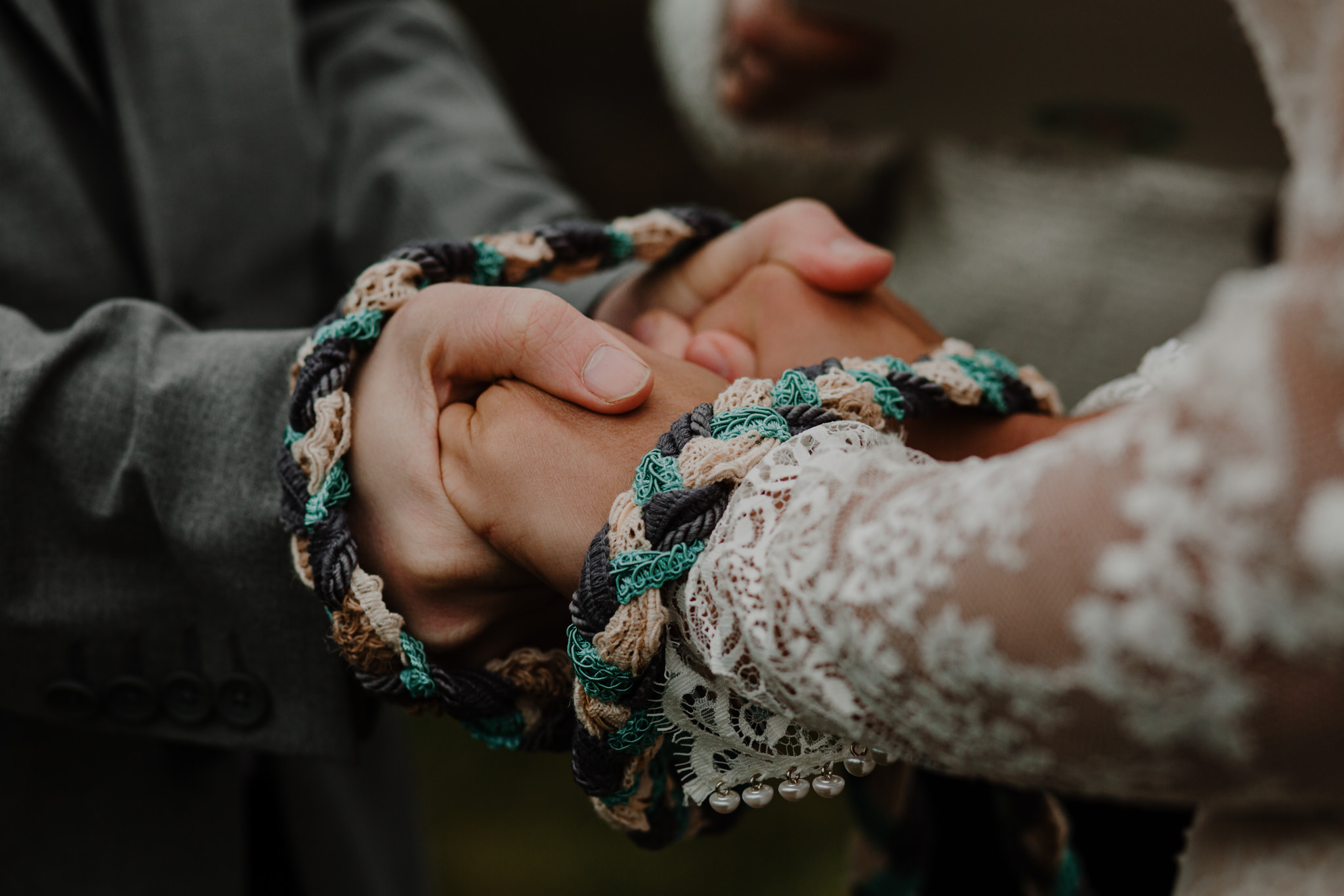 celtic handfasting tradition for irish elopement at dunluce castle