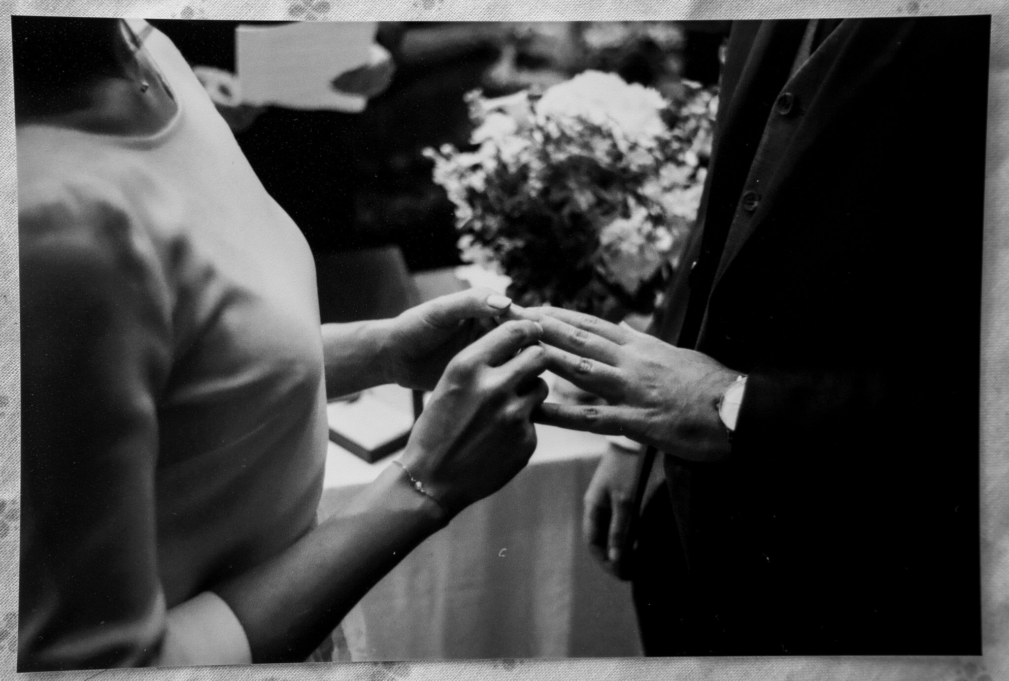 bride and groom exchange rings intimate ceremony West wing Crom Castle Northern Ireland film photography