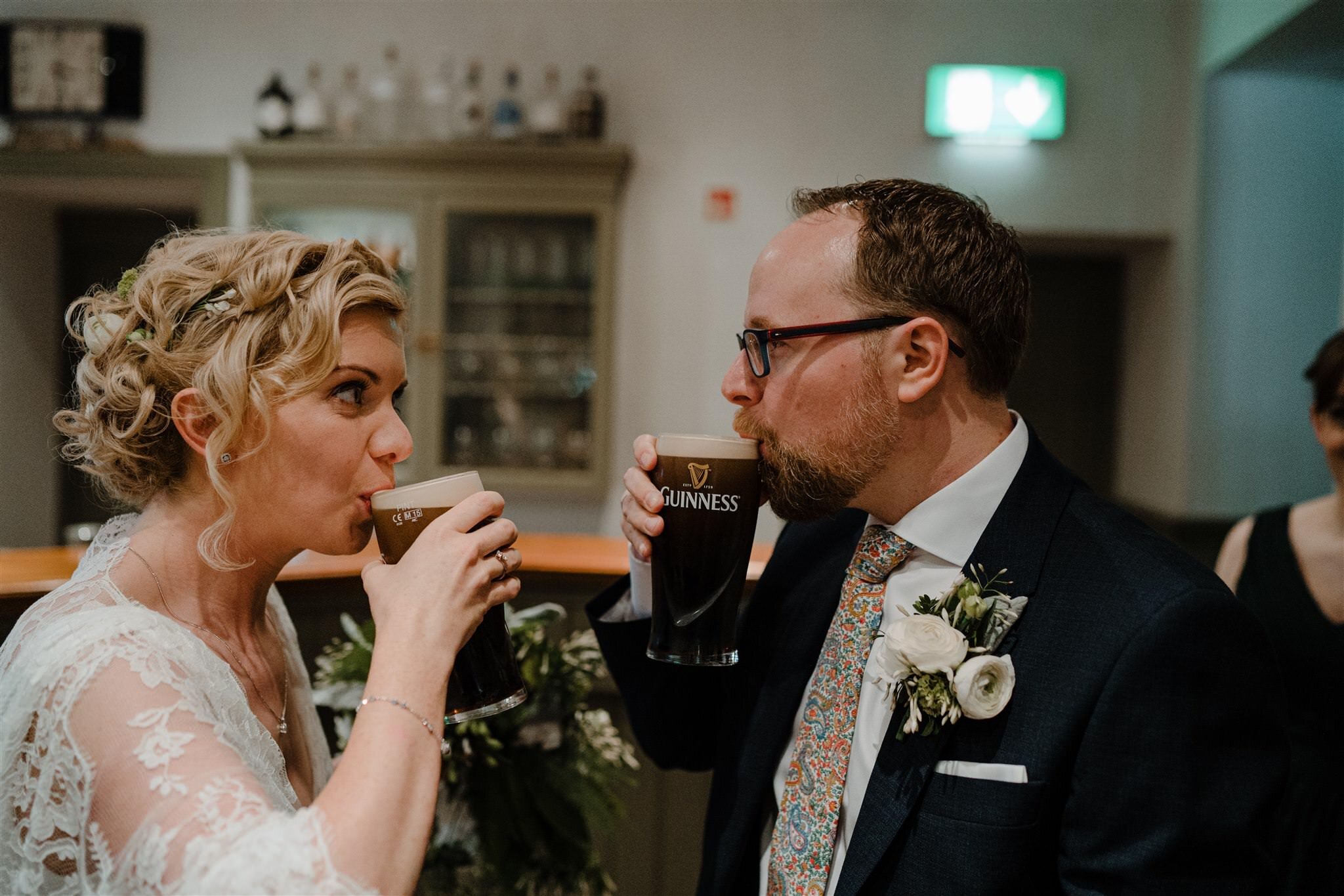 Bride groom first pint Guinness Tullyveery house wedding