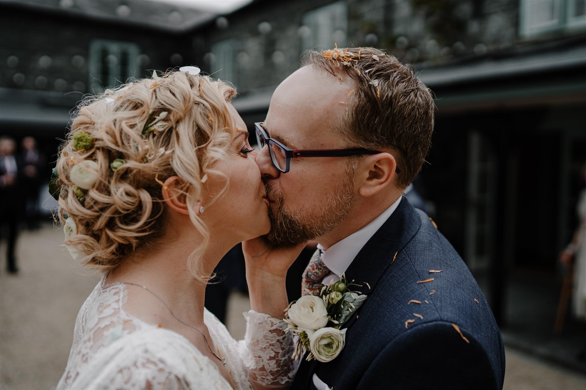 First kiss confetti bride groom outdoor summer wedding Tullyveery house
