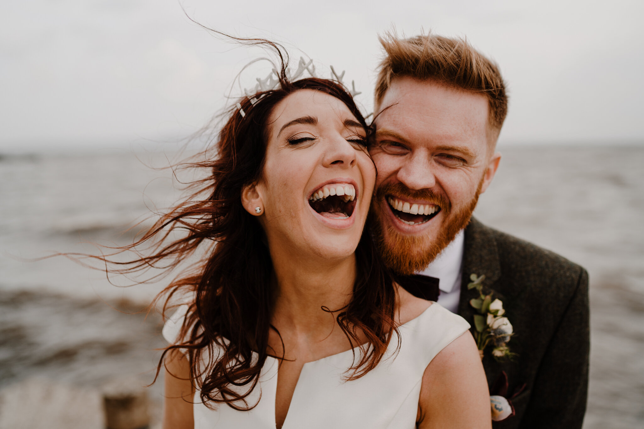 Donegal Wedding Redcastle happy laughing bride groom wild atlantic sea