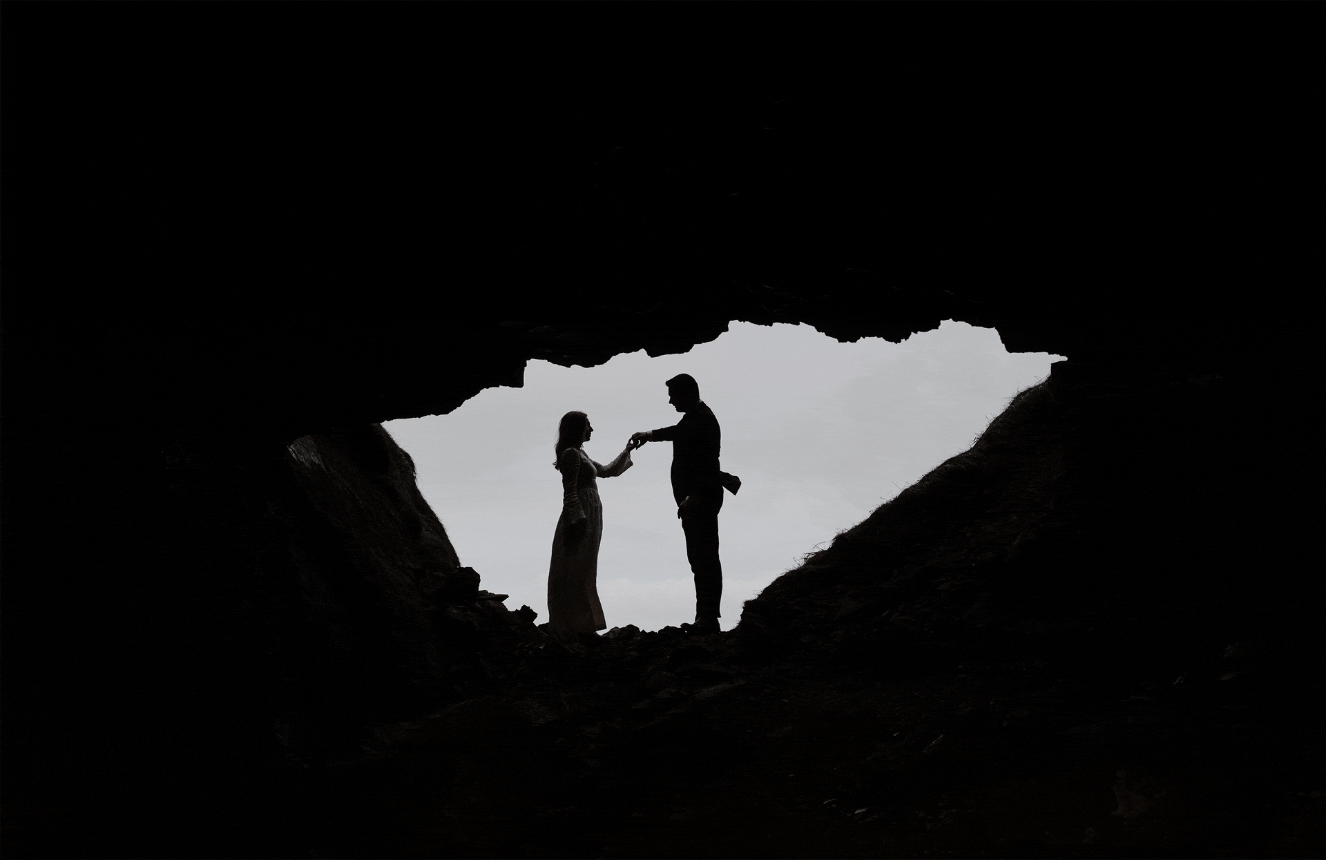 moving image of couple twirling in a cave causeway coast
