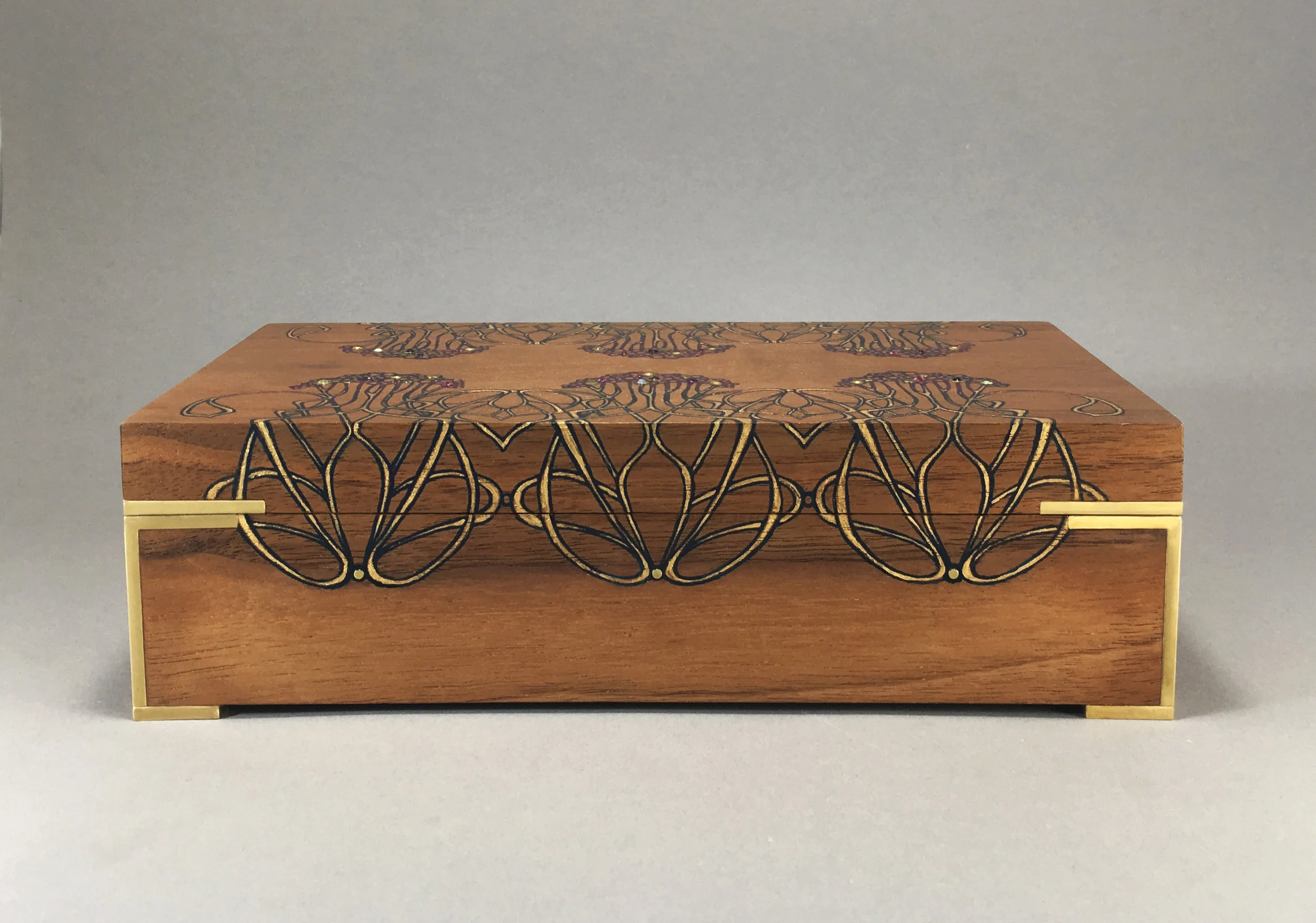 new nouveau box, walnut, 9” x 5” x 2.75”, brass, amethyst, opals, rhodolite and white topaz gemstones, lined with navy suede, $450