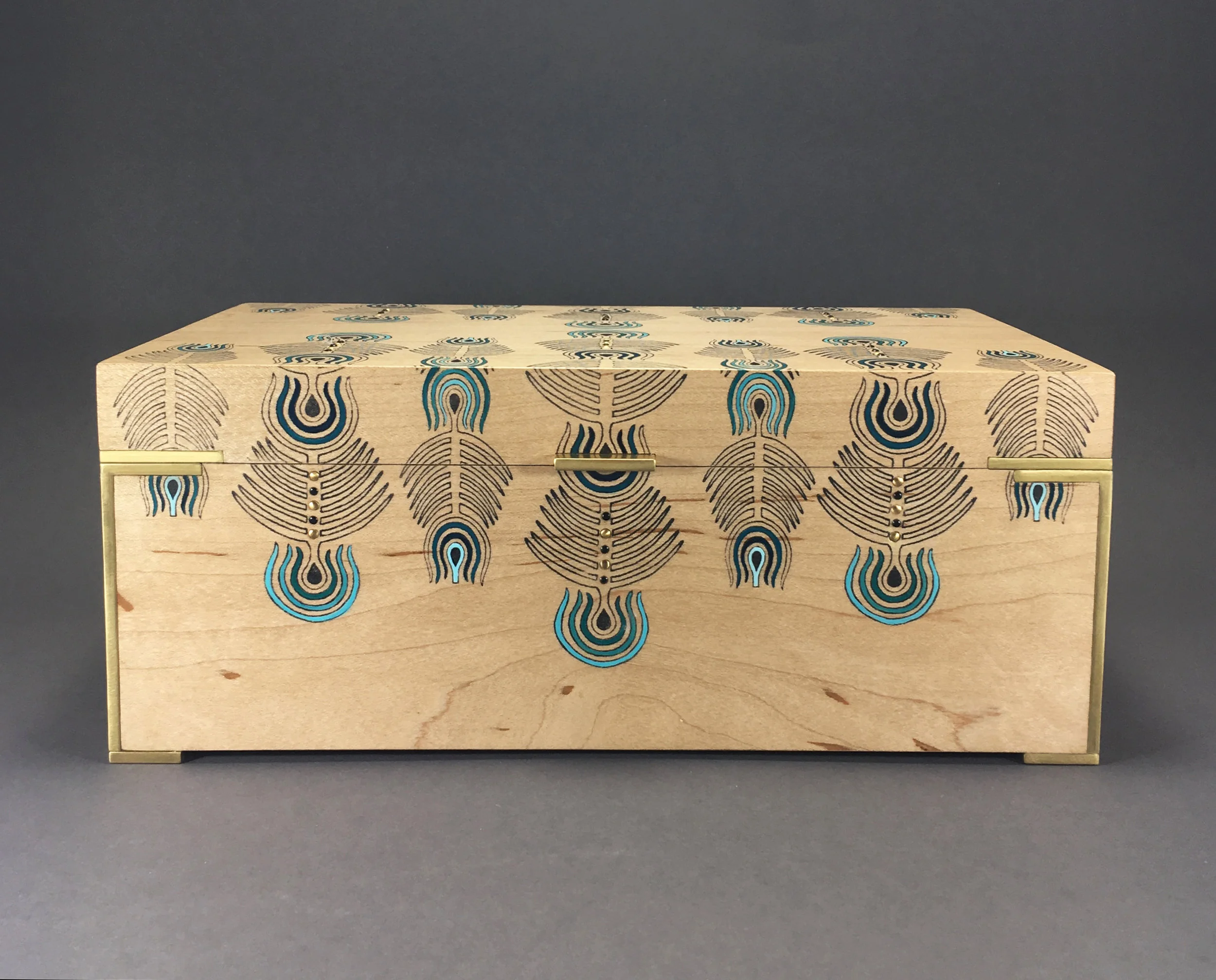 peacock box, maple, 10” x 6” x 4”, brass and black spinel gemstones, solid brass hinges, lined with navy suede with a removable top tray, $600