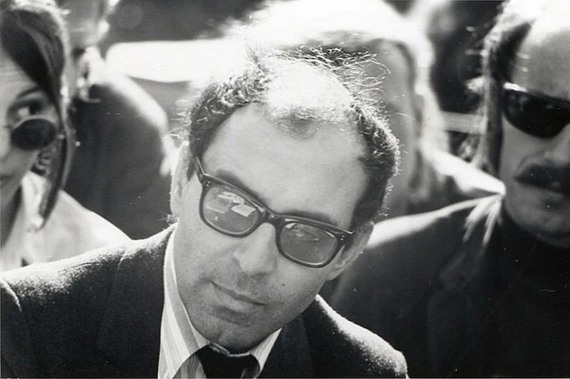 800px-Jean-Luc_Godard_at_Berkeley_1968_1.jpg