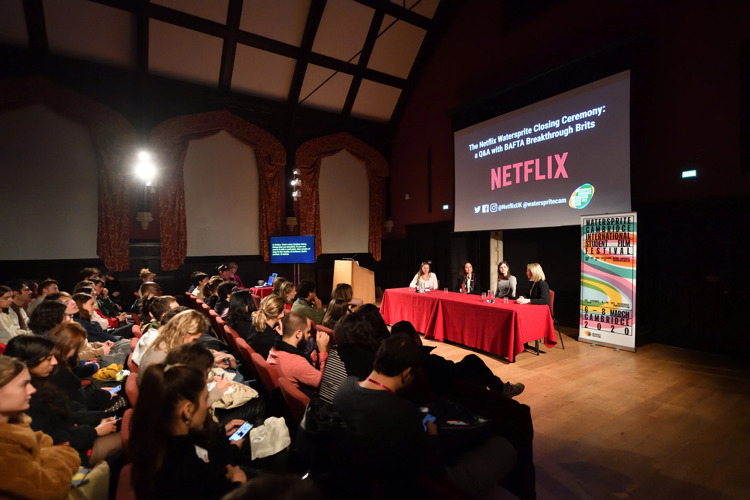 An earlier Watersprite film festival discussion inside a Cambridge hall