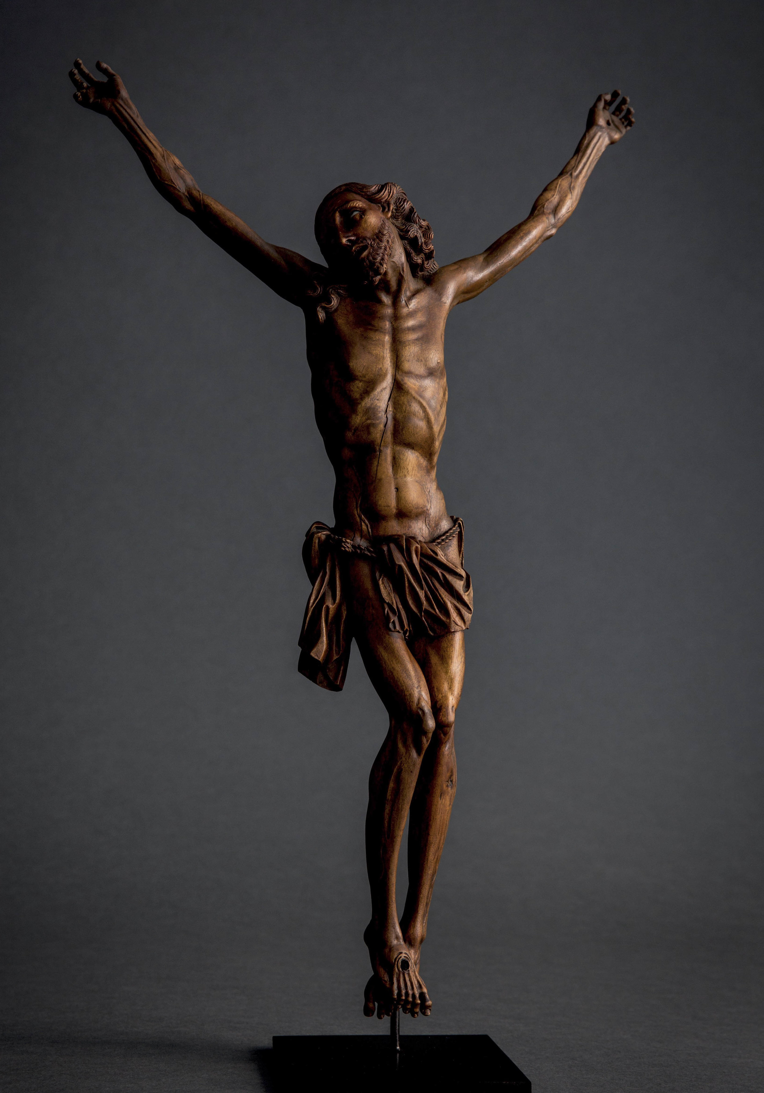  SPANISH OR HISPANO–PHILIPPINE     Crucified Christ   Second half 17th century    Fruitwood and painted glass  43 cm. high    Sold to the Birmingham Museum of Art, Alabama  