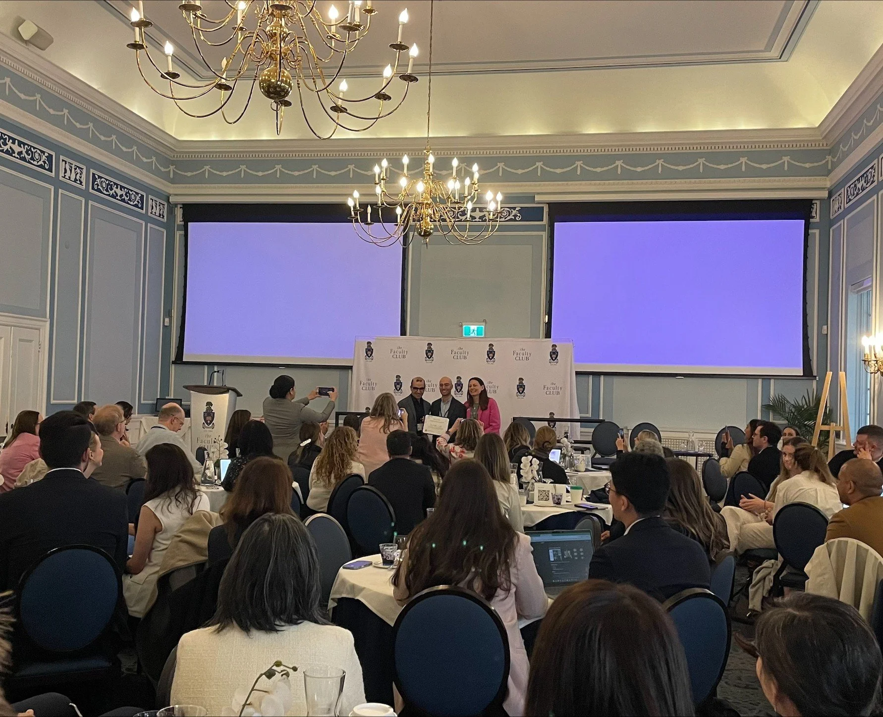 2026 BCC-CSSO Award recipient Matthew Castelo presentation full room-small.jpeg