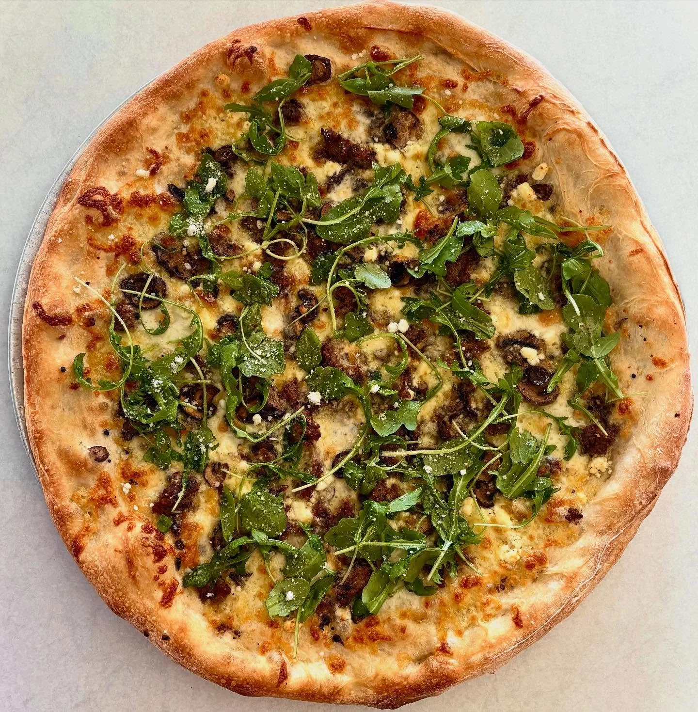 ⚡️New Feature⚡️

Introducing the Sgt. Pepper 

Garlic Oil, Fior Di Latte Mozz, Black Pepper, Sausage, Roast Mushrooms, Arugula, and Parmesan 

Available Now at our Hamilton Location 📍
.
.
.

#hamont #hamonteats #hamiltonont 
#pizza