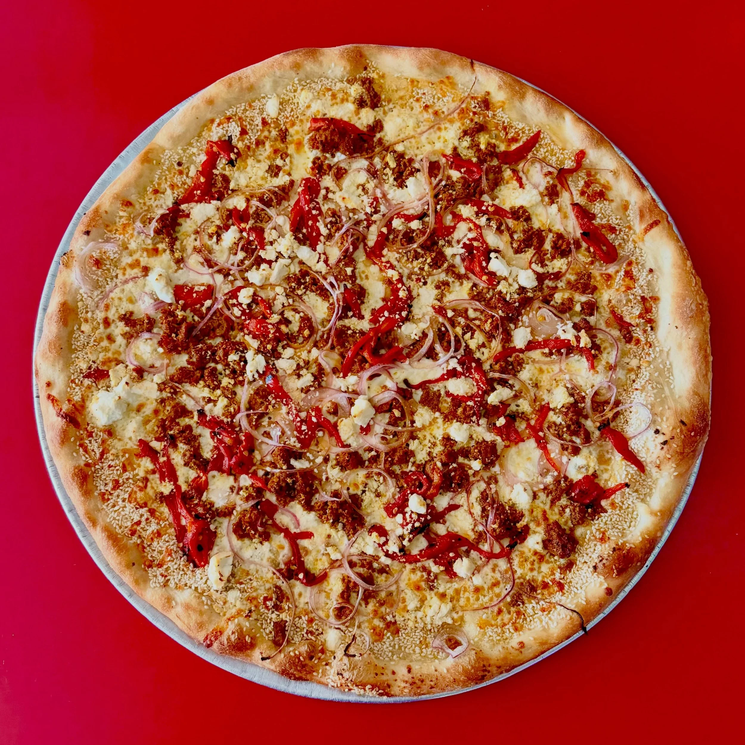 ⚡️New Feature⚡️

The &lsquo;Rockin&rsquo; Moroccan&rsquo;

Garlic Oil Base, Shredded Mozzarella, Creamy Feta Cheese, Harissa Spiced Lamb Sausage, Roasted Red Peppers, Red Onion, and a Sesame Seed Crust

Available now for a limited time at BOTH of our