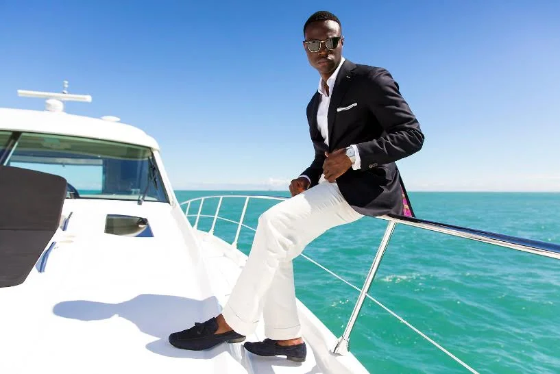 Linen trousers and dress shirt with a lightweight blazer. Credit: Oren A Photo