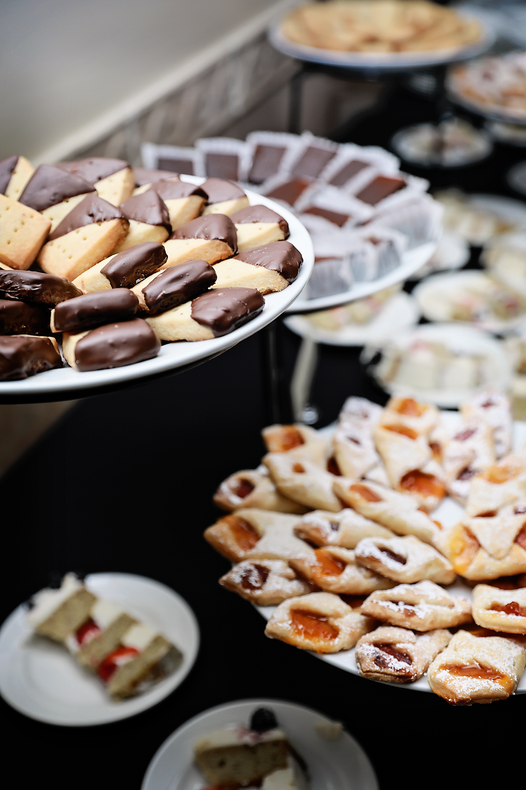 Chocolate dipped short bread cookies and kolacky cookies to reflect the grooms’ English and Polish background. Photo by: Alicia’s Photography