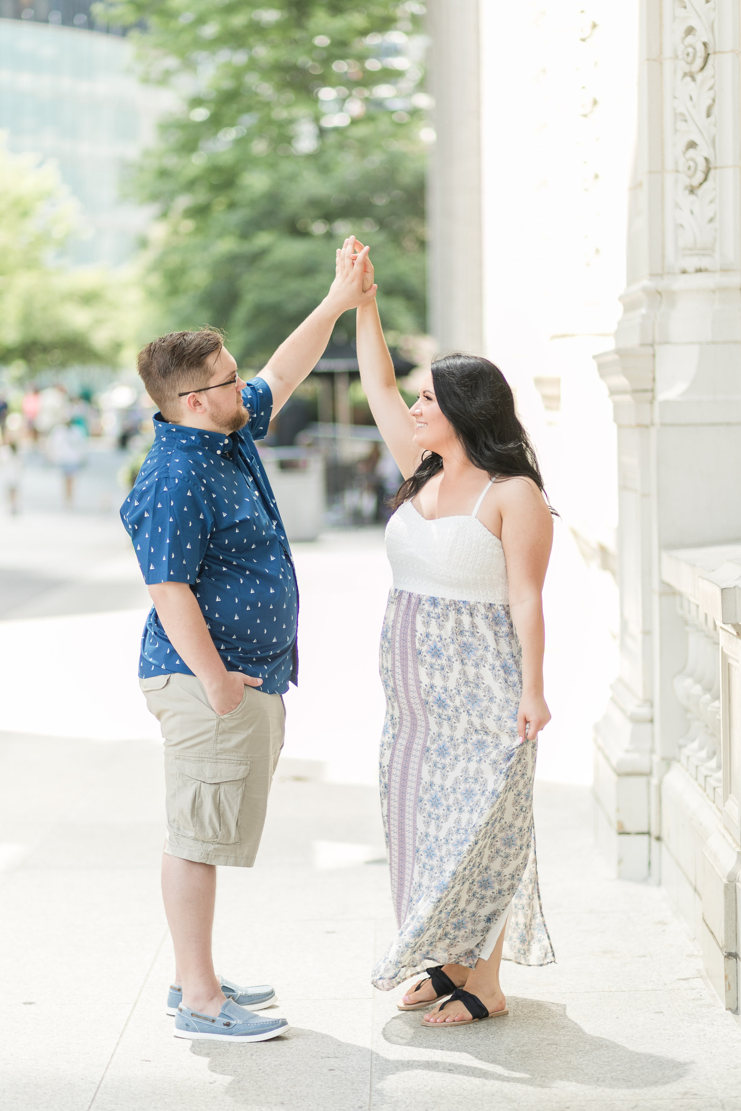 Summer downtown Chicago engagement session captured by Megan Goggins Photography. Find more inspiration at CHItheeWED.com!