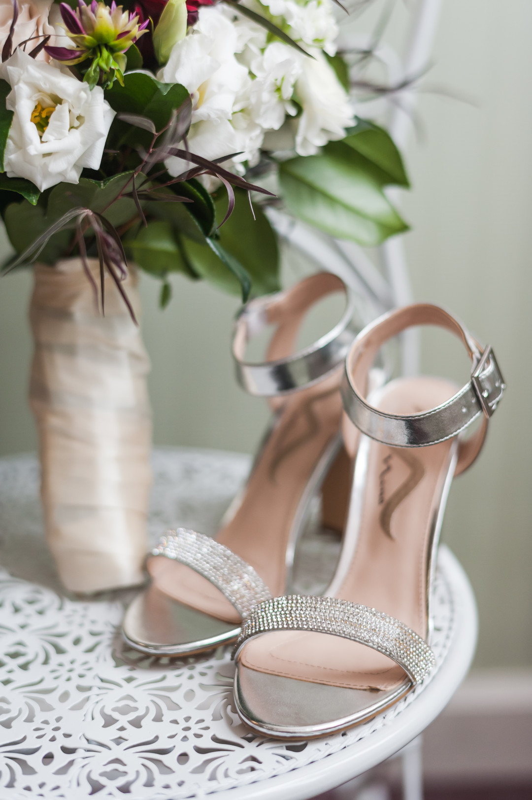 Elegant ballroom wedding with deep reds and silver accents at the White Eagle Golf Club in Naperville, IL captured by Elite Photo. Find more unique wedding ideas at CHItheeWED.com!