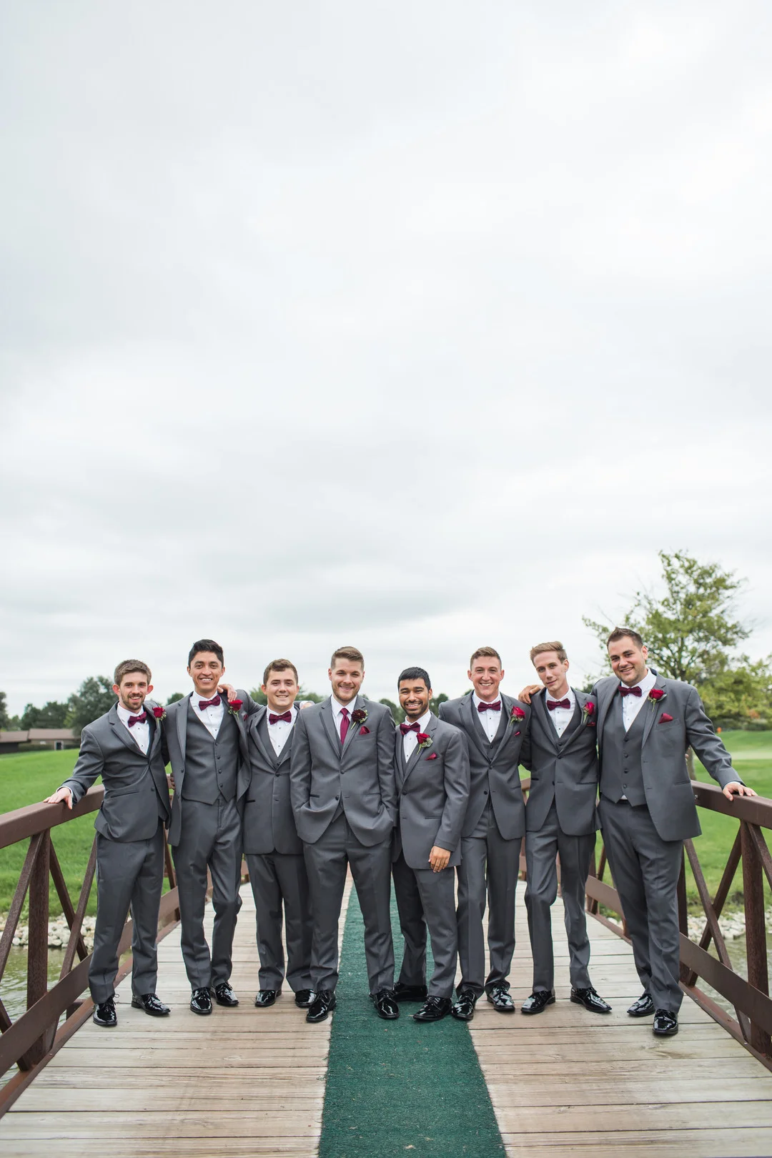 Elegant ballroom wedding with deep reds and silver accents at the White Eagle Golf Club in Naperville, IL captured by Elite Photo. Find more unique wedding ideas at CHItheeWED.com!