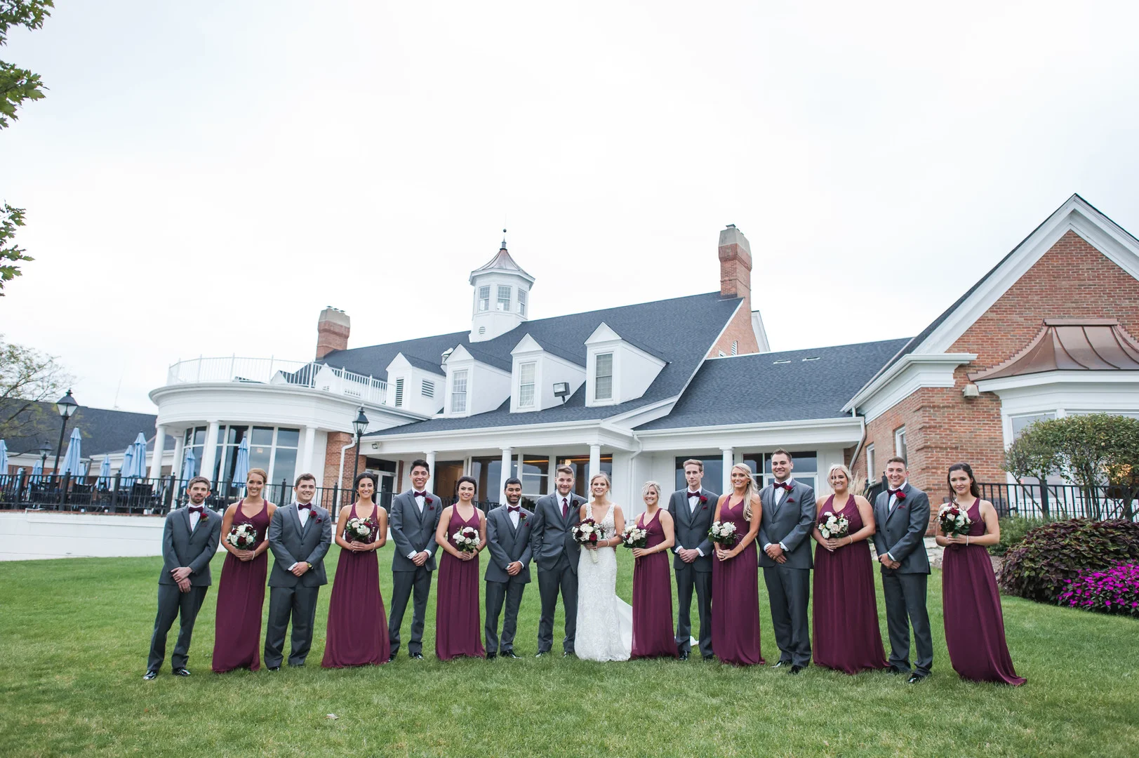 Elegant ballroom wedding with deep reds and silver accents at the White Eagle Golf Club in Naperville, IL captured by Elite Photo. Find more unique wedding ideas at CHItheeWED.com!