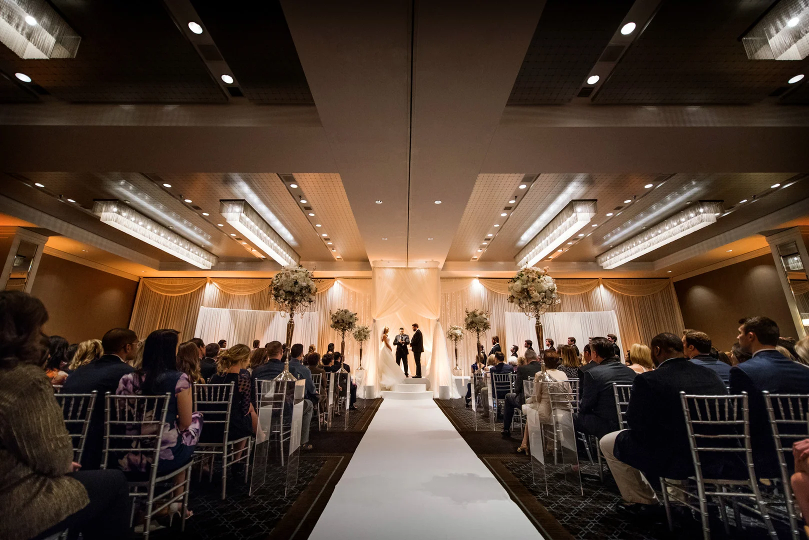 Luxurious winter wedding at Hotel Arista in Naperville, IL captured by Jason Kaczorowski Photography. See more winter wedding ideas at CHItheeWED.com!