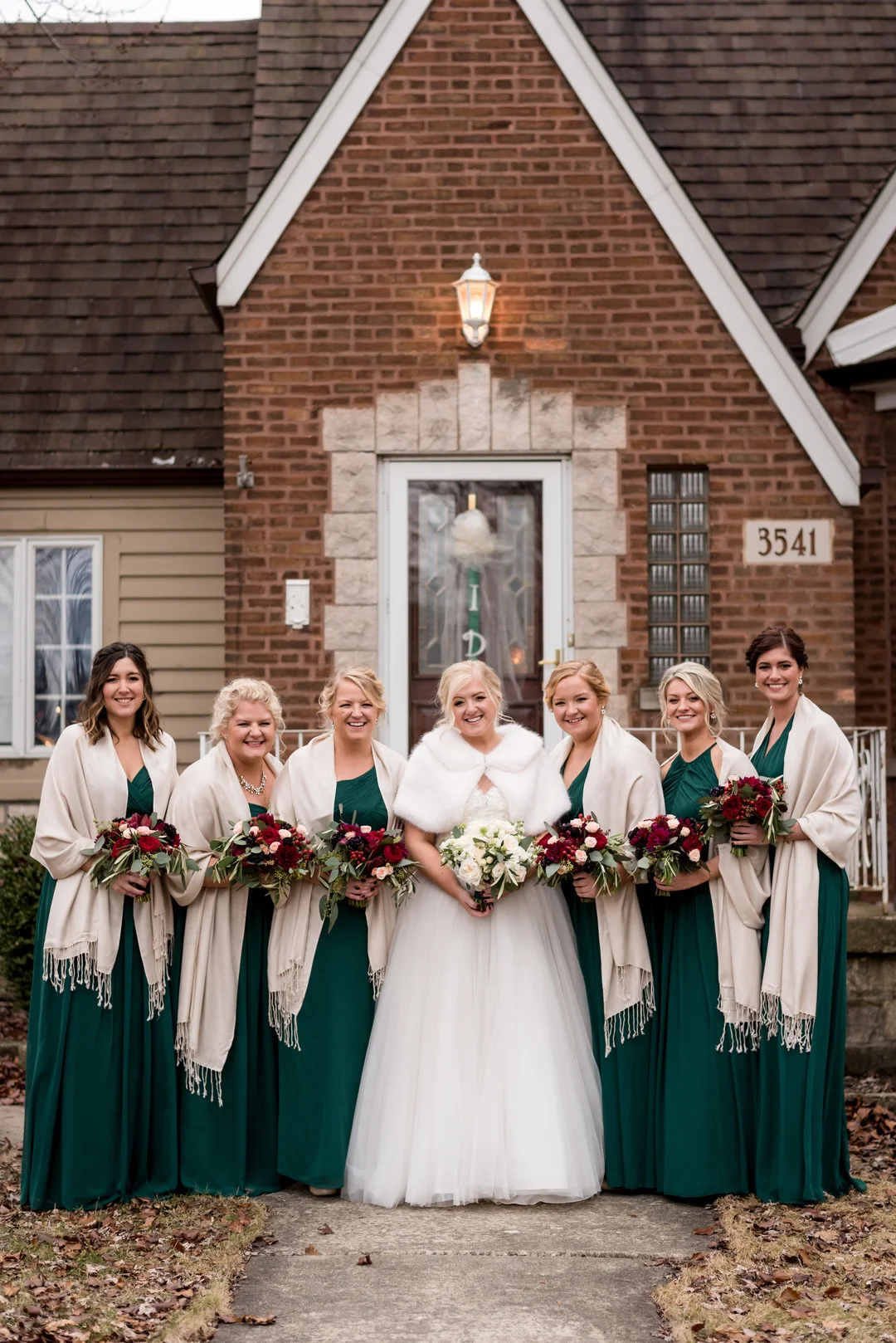 Romantic Chicago winter wedding with Christmas colors captured by Julia Franzosa Photography. See more winter wedding ideas at CHItheeWED.com!