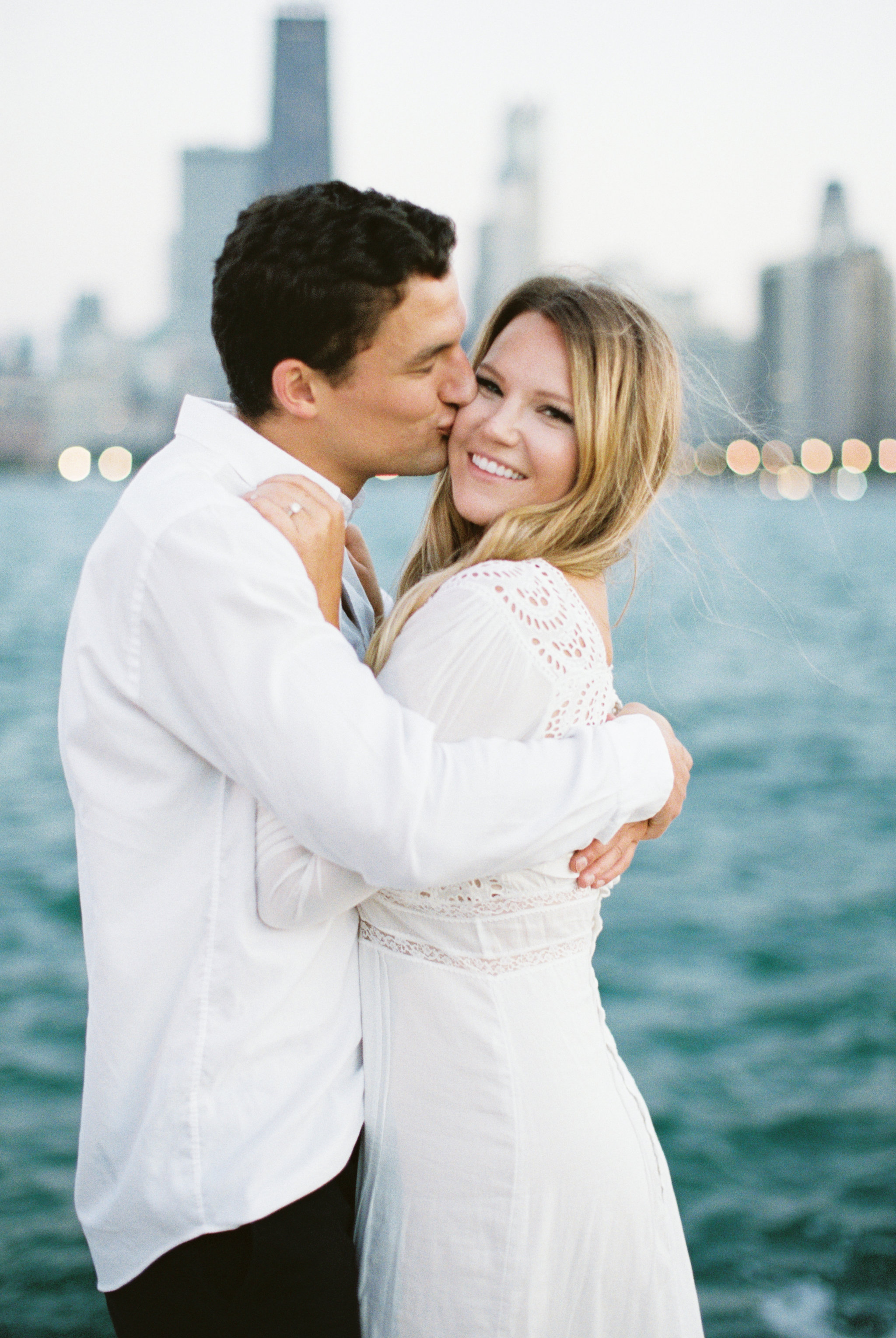 Romantic North Avenue Beach Chicago engagement session captured by Kendra Denault Photography. See more engagement photo ideas on CHItheeWED.com!